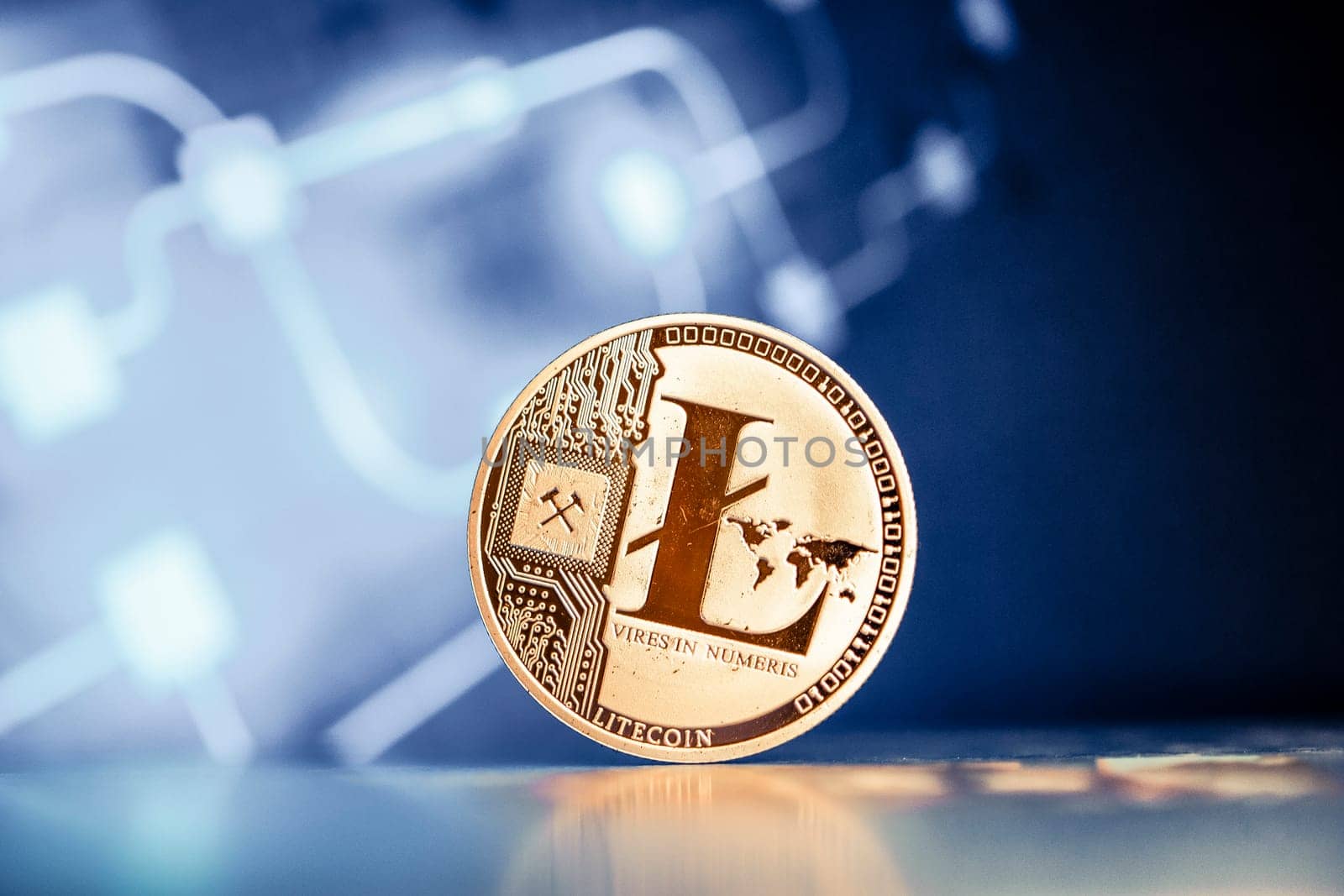 litecoin on blue chart background cryptocurrency concept