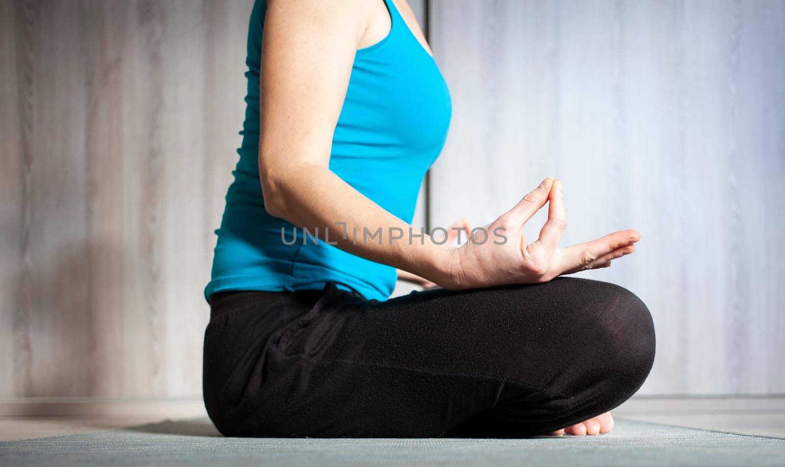 woman doing yoga at home