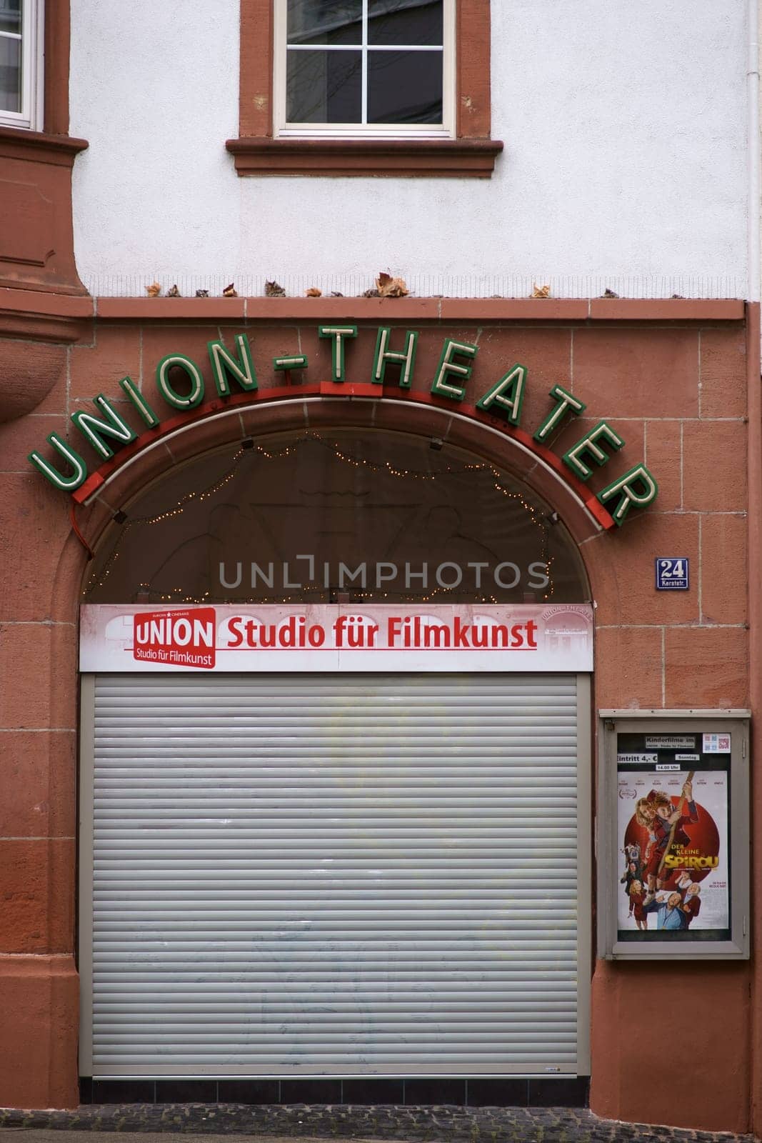 Kaiserslautern, Germany - January 26, 2019: Lowered blinds at the closed entrance of the Union Theater, the studio for film art on January 26, 2019 in Kaiserslautern....