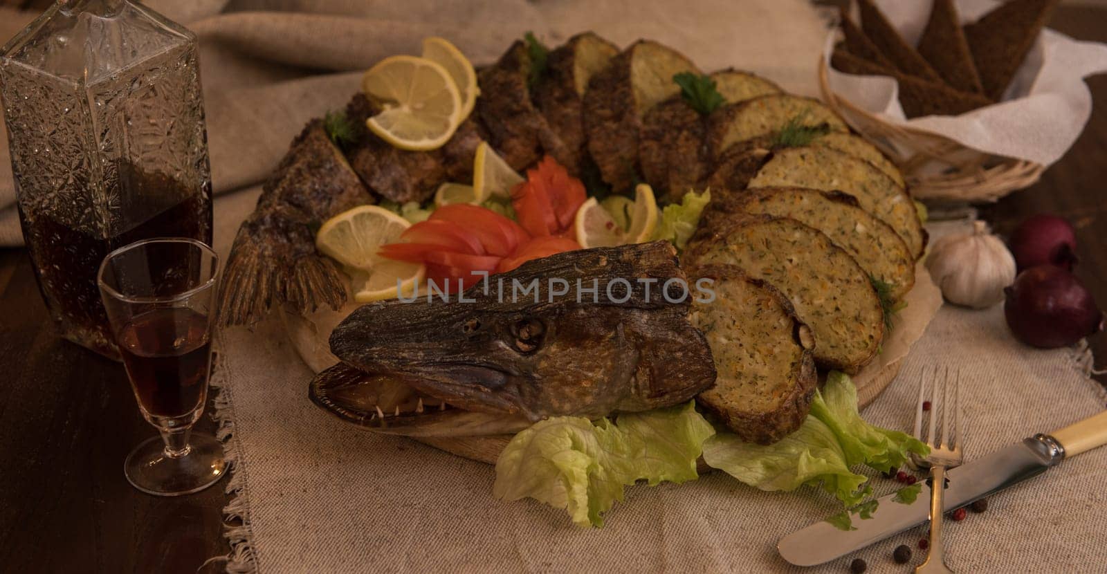 Stuffed pike with vegetables and greens. Russian food