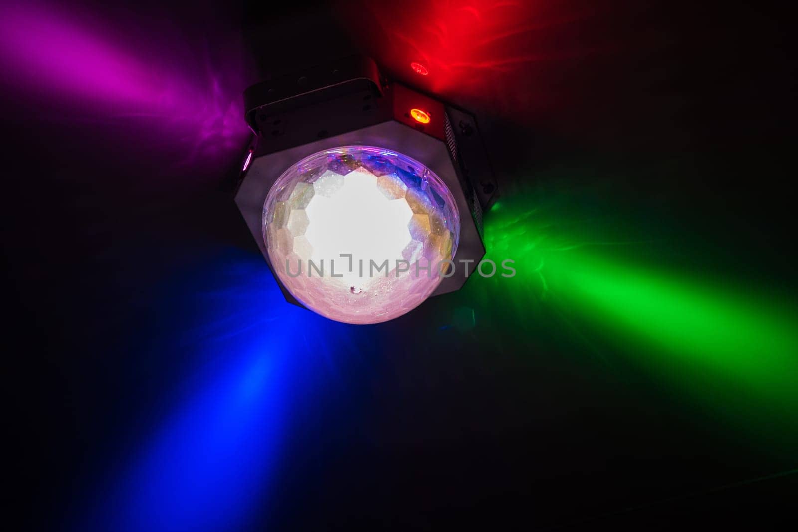 Colorful disco ball in night club, party concept