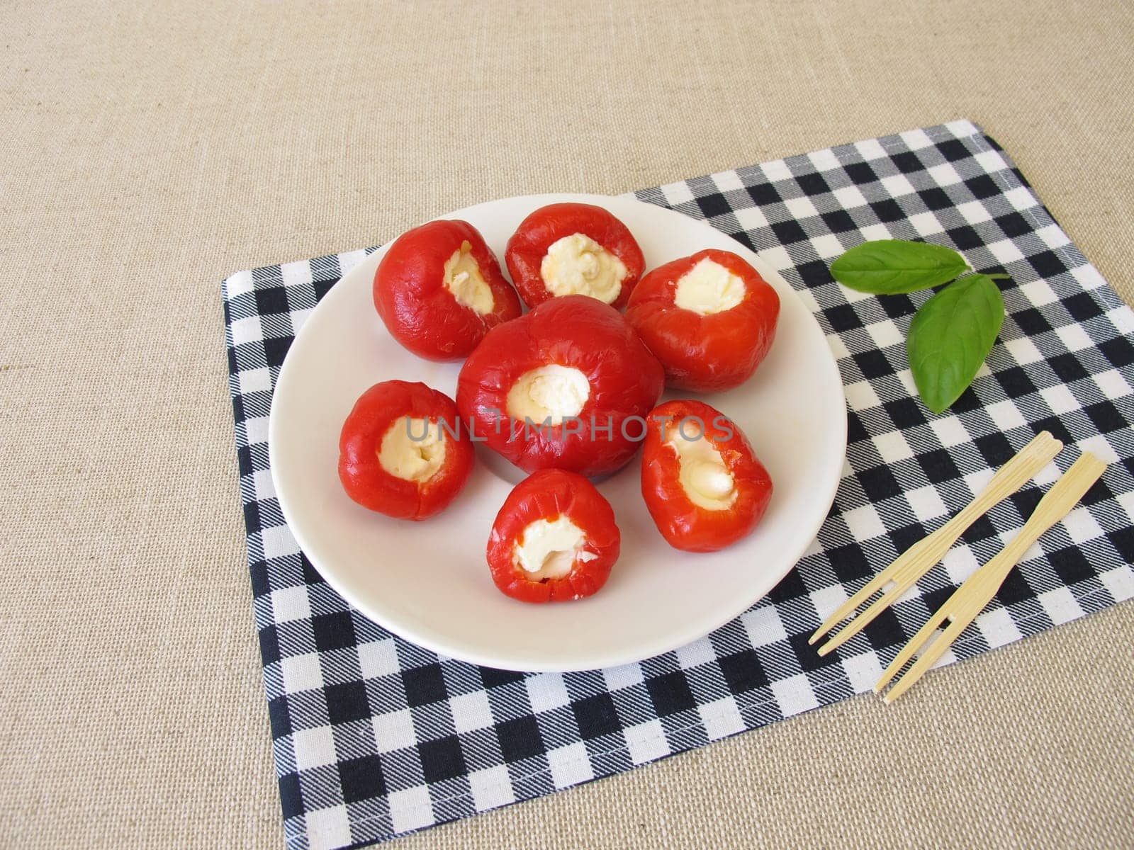 Red cherry pepper stuffed with fresh cheese