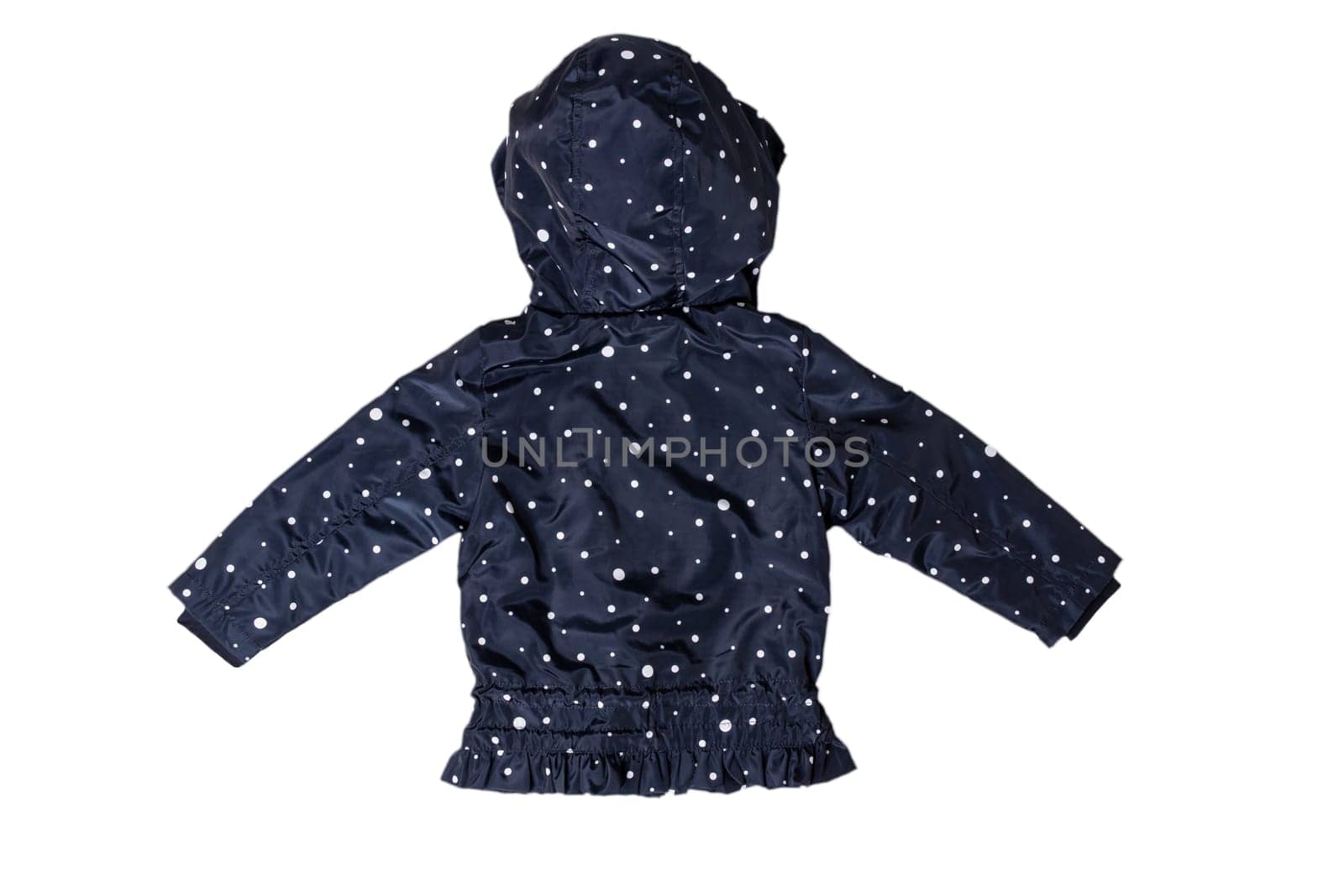 Kids jacket isolated. A stylish fashionable dark blue jacket with white dots and blue white striped lining for the little girl. A rain coat and windbreaker with hood for spring and autumn. Back view.