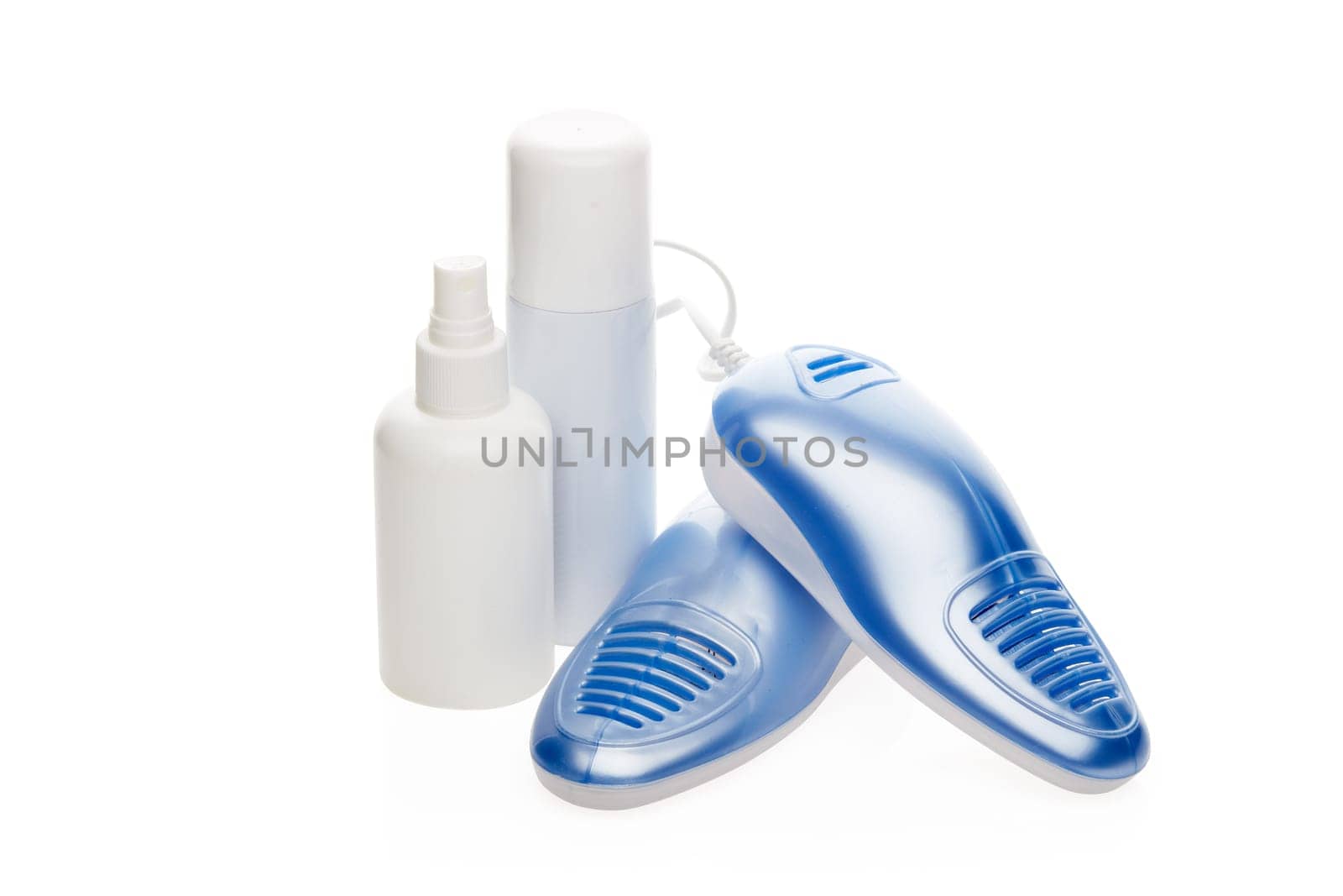 Electric shoes dryer with UV sterilization on a white background, Deodorant for shoe and antifungal agent. Shoe care products. Concept of healthy feet