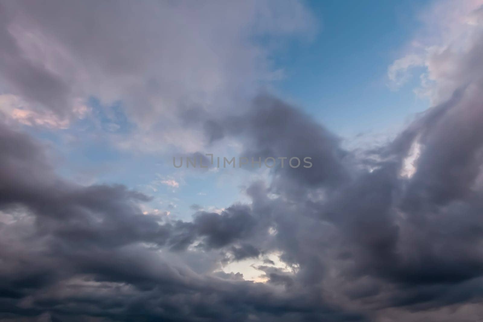 Unusual cloudy skies with dramatic grey clouds with some blue sky.