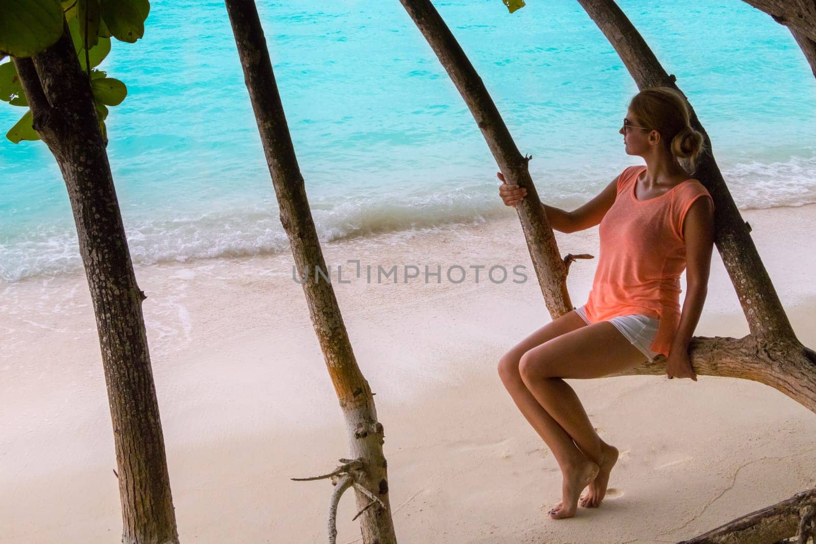 Beautiful woman resting by the sea