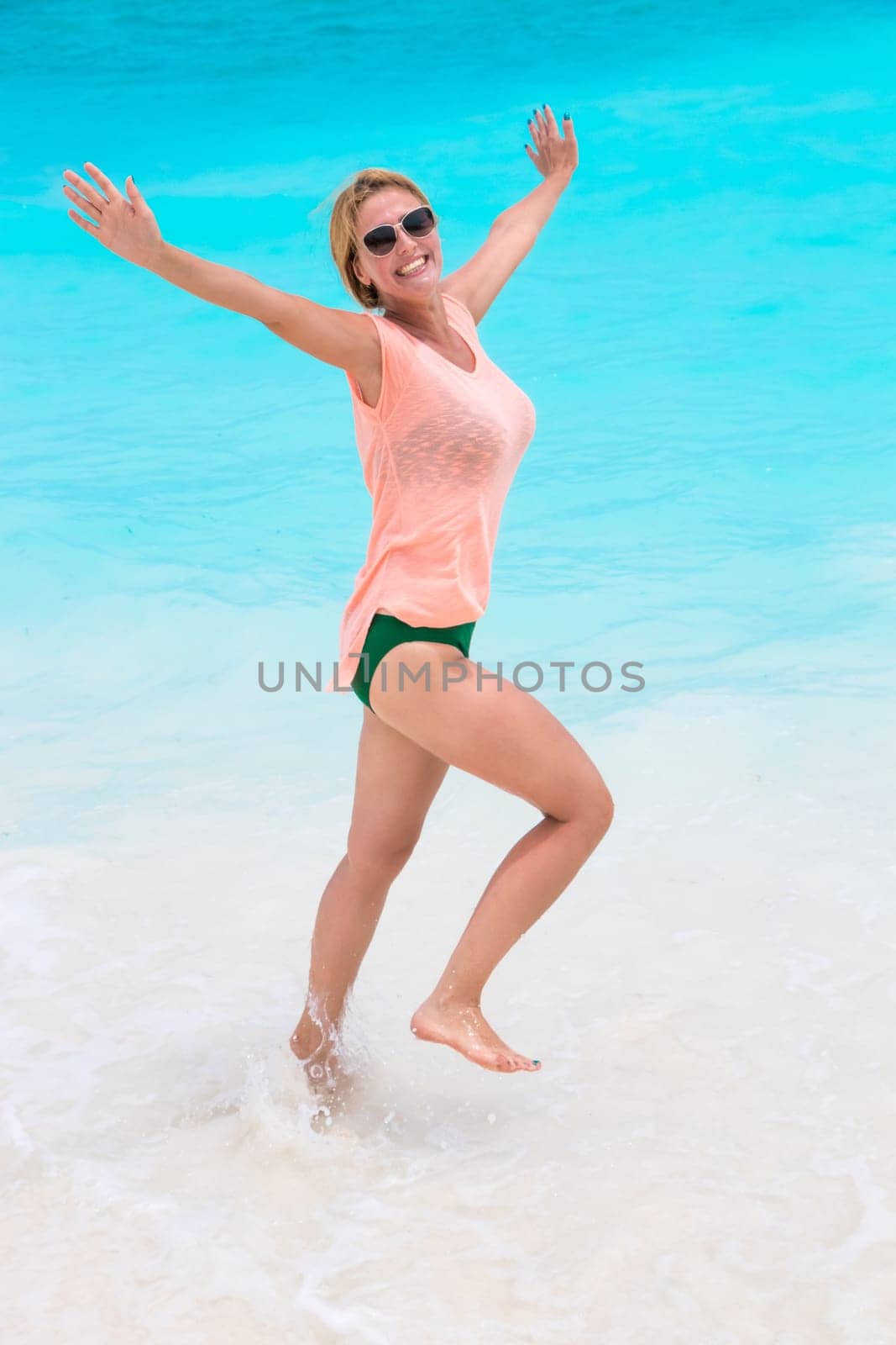 Woman on the beach in Maldives