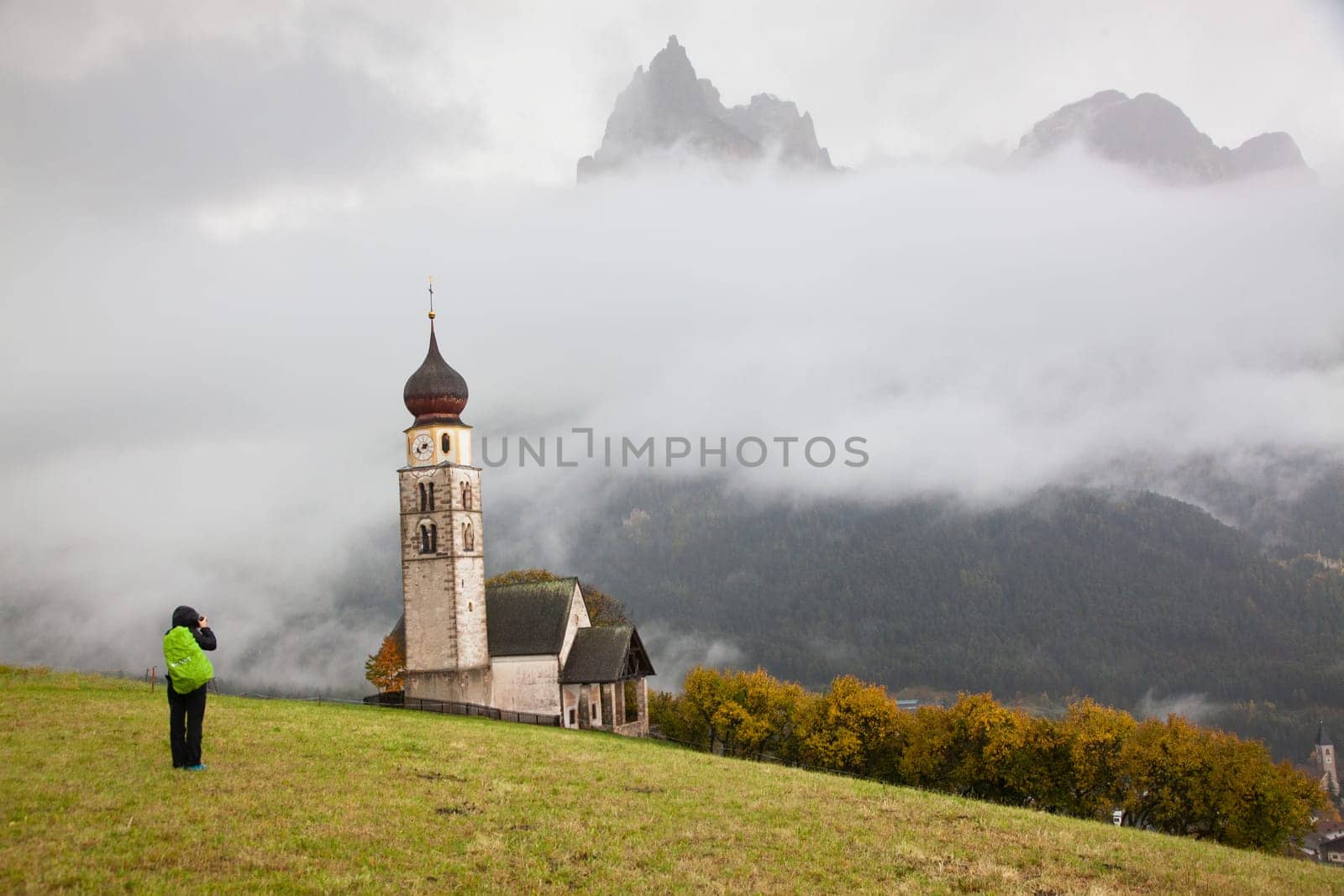 san Valentino church on a foggy late autumn day, Siusi allo Sciliar, Castelrotto, Dolomites, Italy