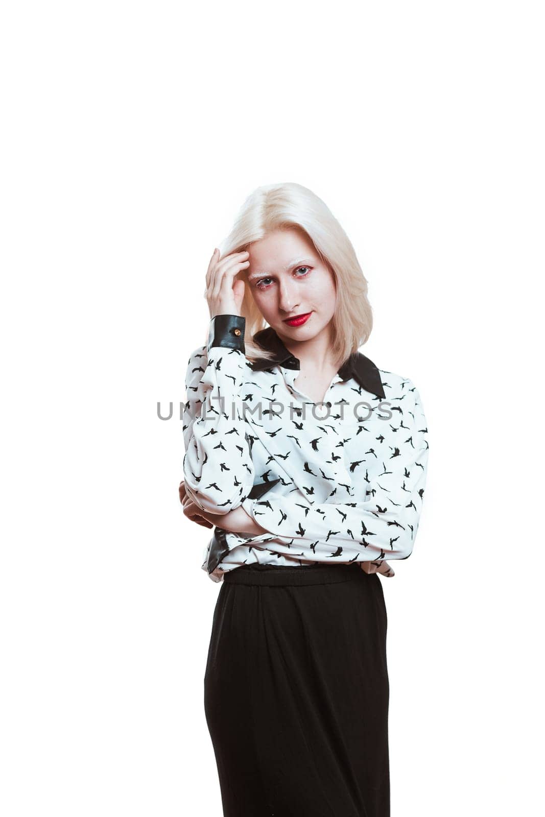 portrait blonde albino girl in studio on white background.