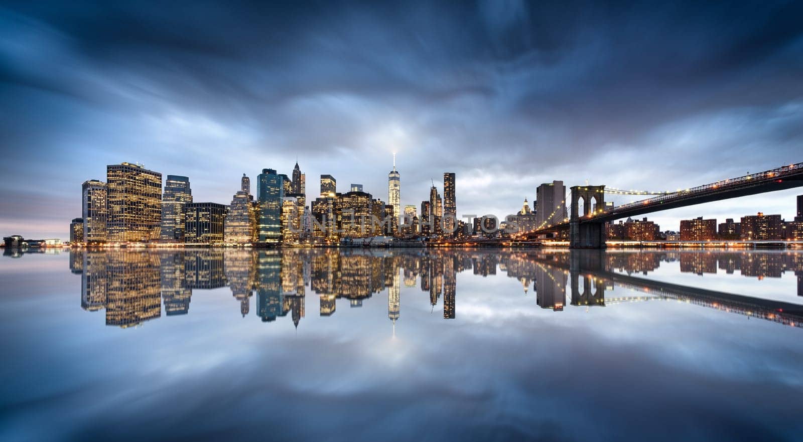 New York City skyline with urban skyscrapers at sunset, USA.