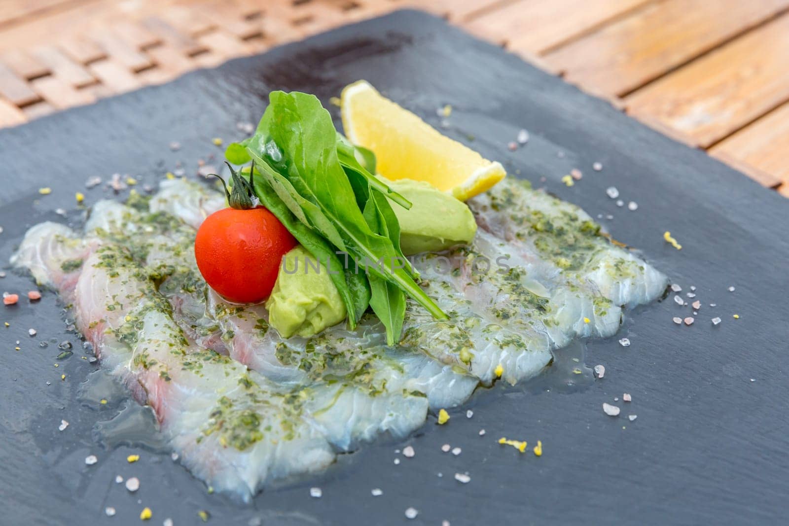 Sea bass sashimi mediterranean style cuisine