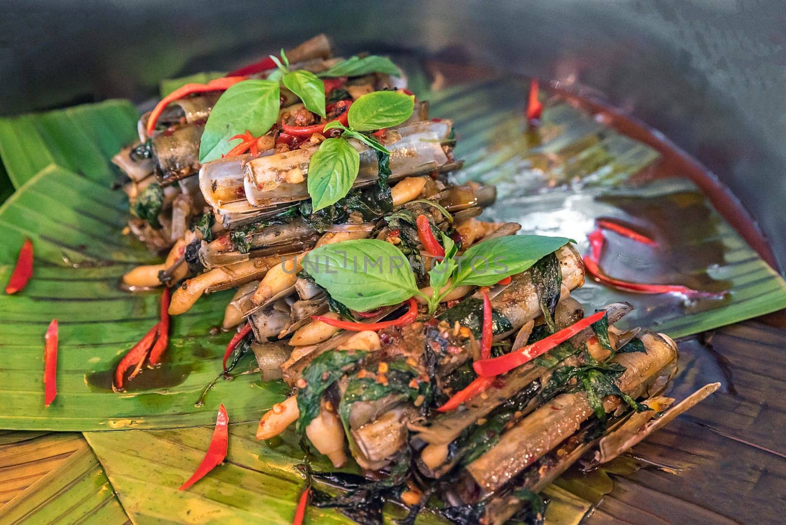 clam razor shell Solenidae stir spicy with paste and basil