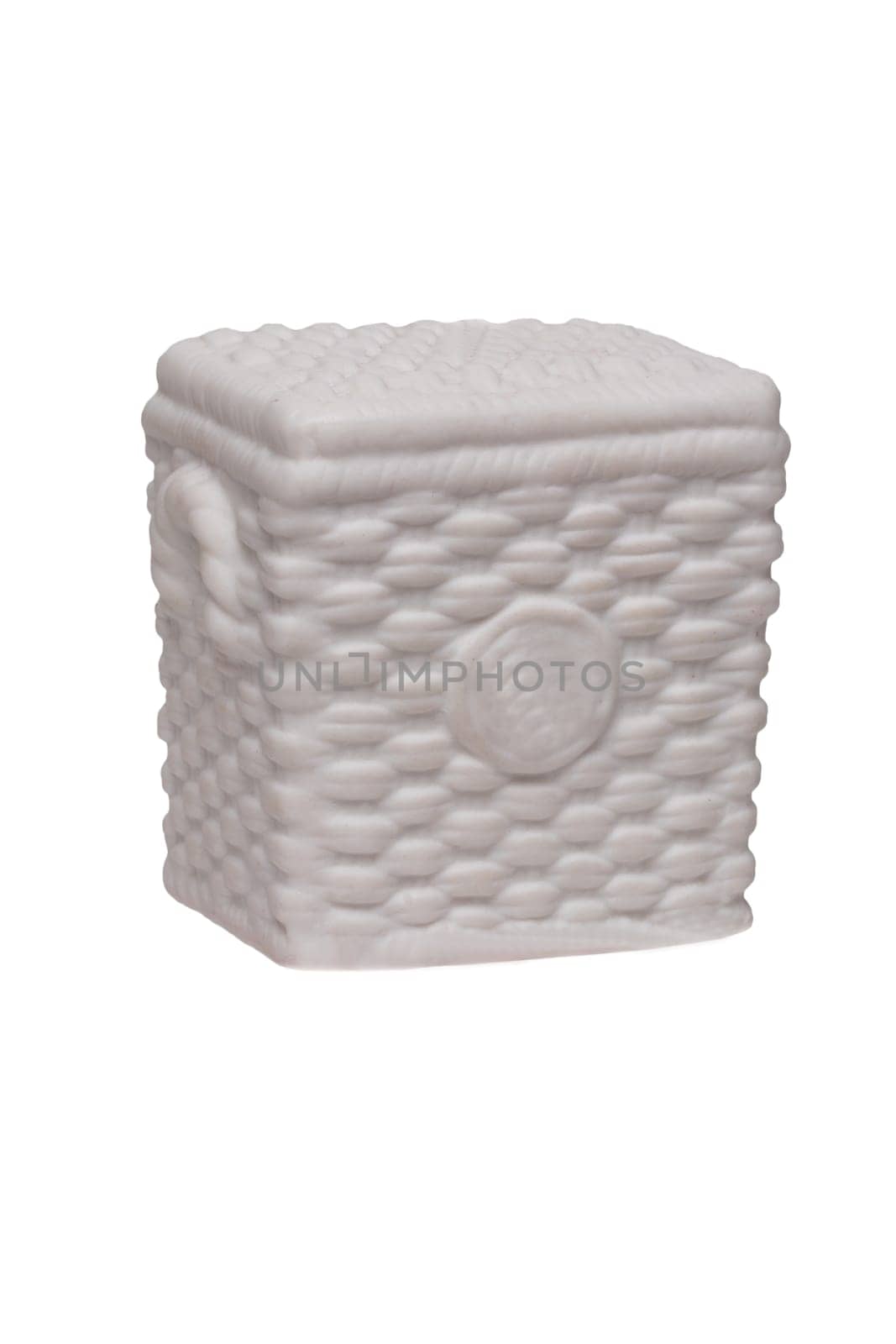 Basket background. Closeup of a white laundry basket made from ceramic material isolated on a white background. Macro.