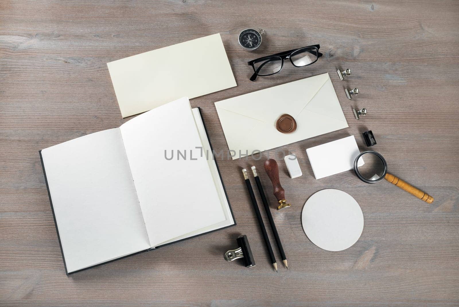 Retro stationery template on wood table background. Responsive design mock up.