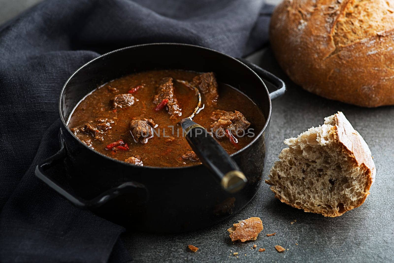 Portion of traditional Beef stew - goulash with bread