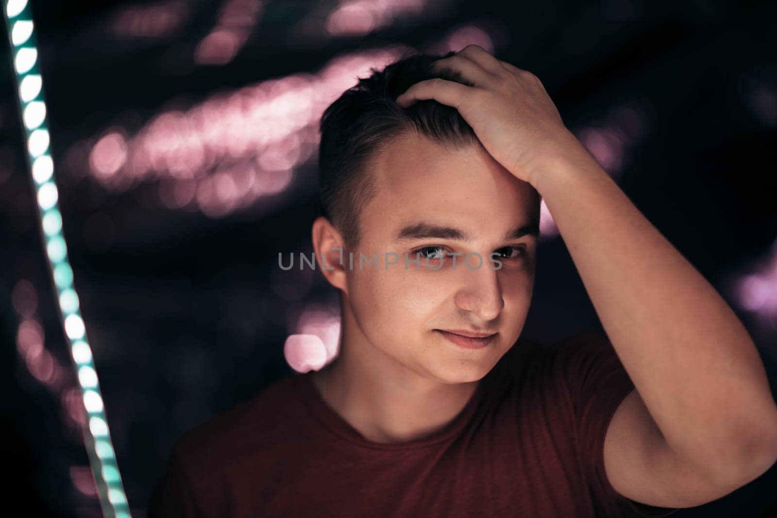 portrait of a young man on a blurred background.