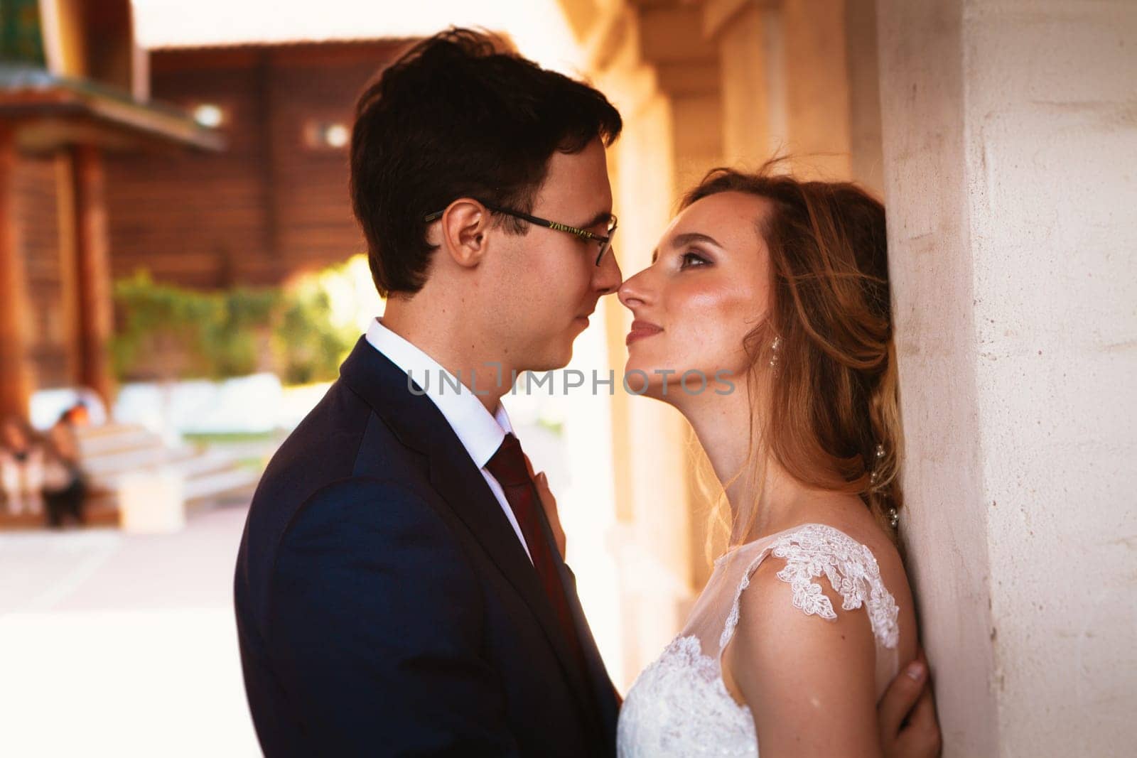 bride and groom on the background of the Kolomna Palace.