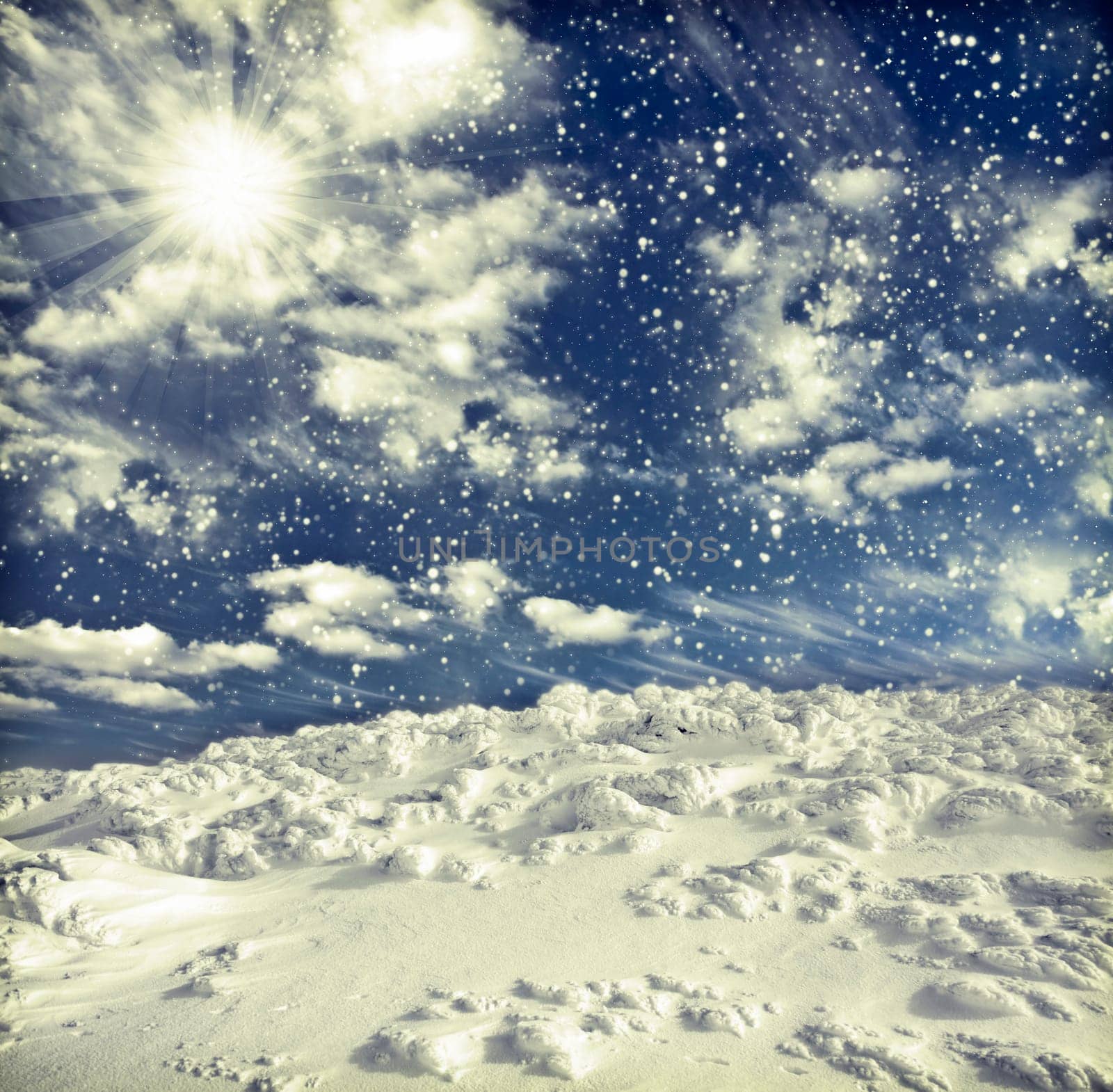 Winter landscape with snow covered hill and cloudy blue sky