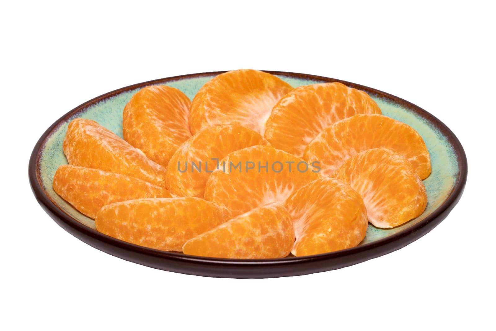 Mandarine isolated. Close-up of fresh ripe peeled mandarin orange tangerine or clementine on a plate isolated on a white background. Macro.