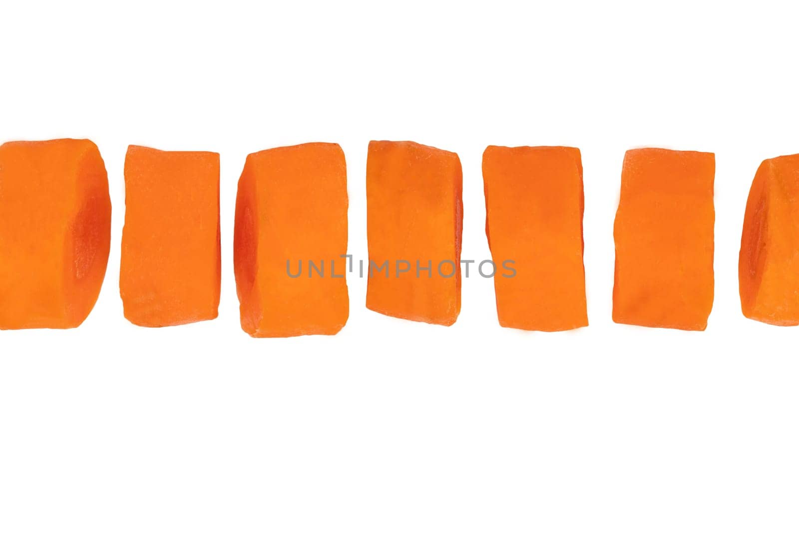 Vegetable food. Close-up of sliced carrots isolated on a white background. Macro.