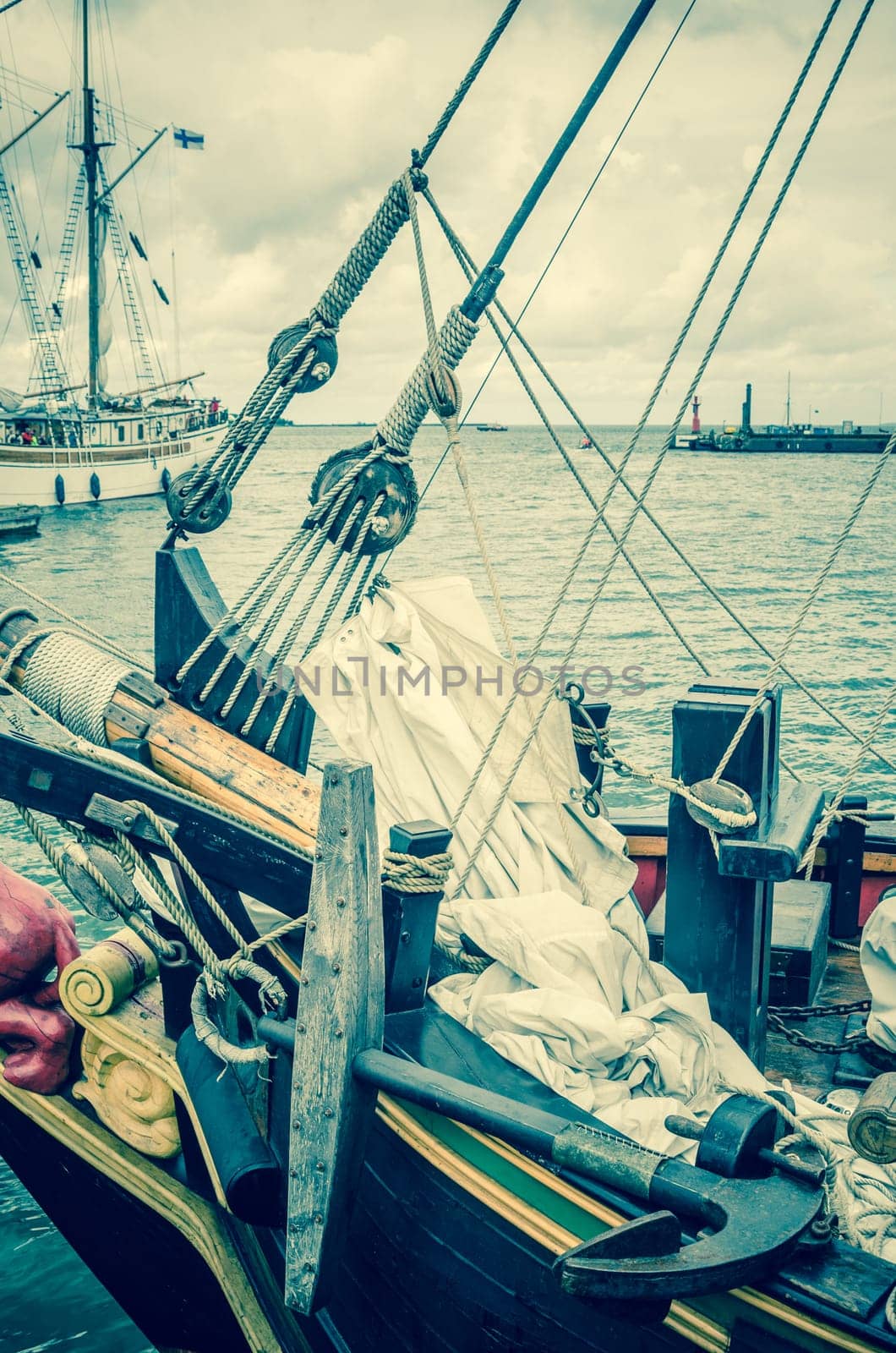 Old sailboat in the harbor, toning