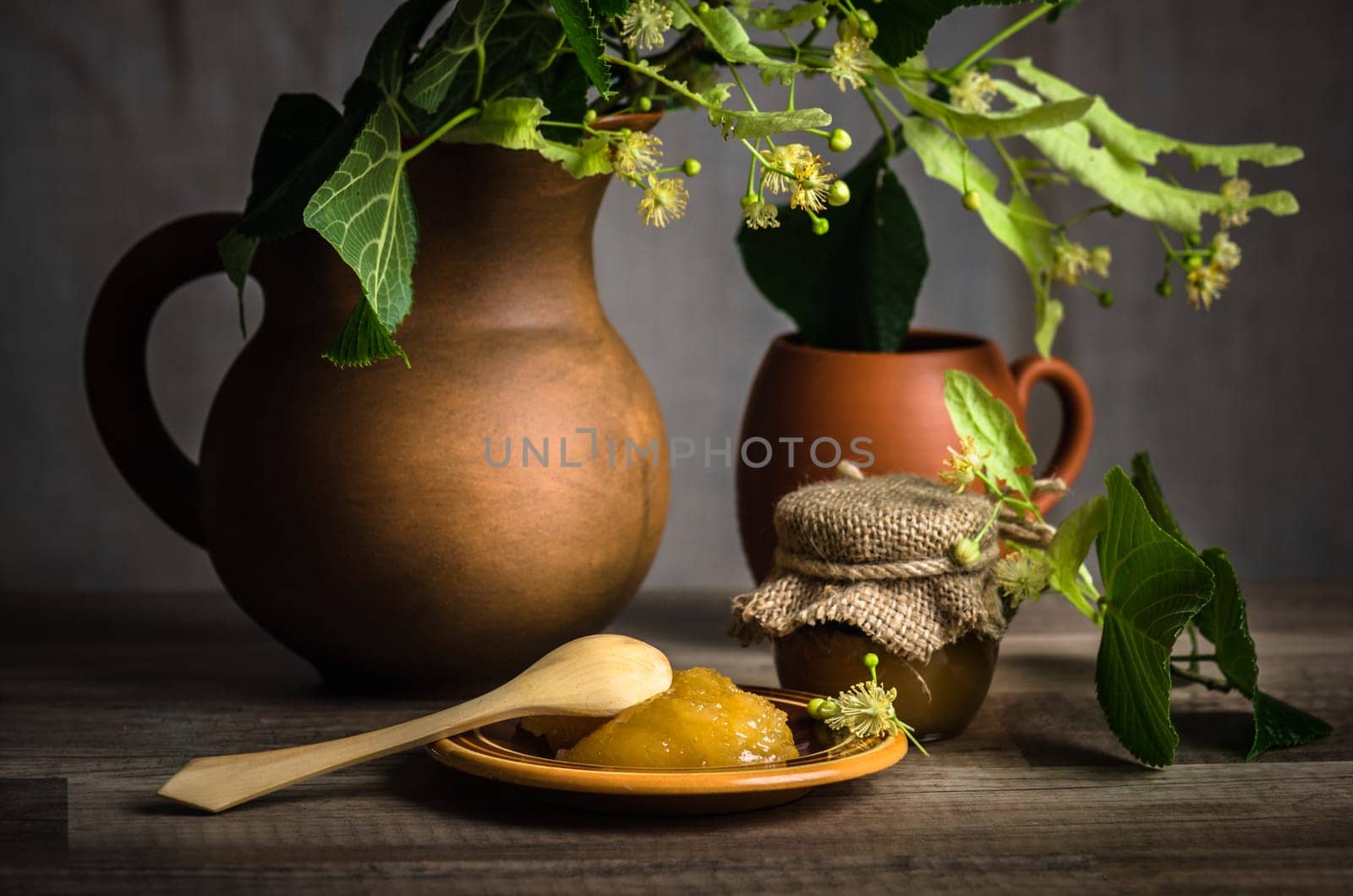 Jar with white honey on the table,.close-up