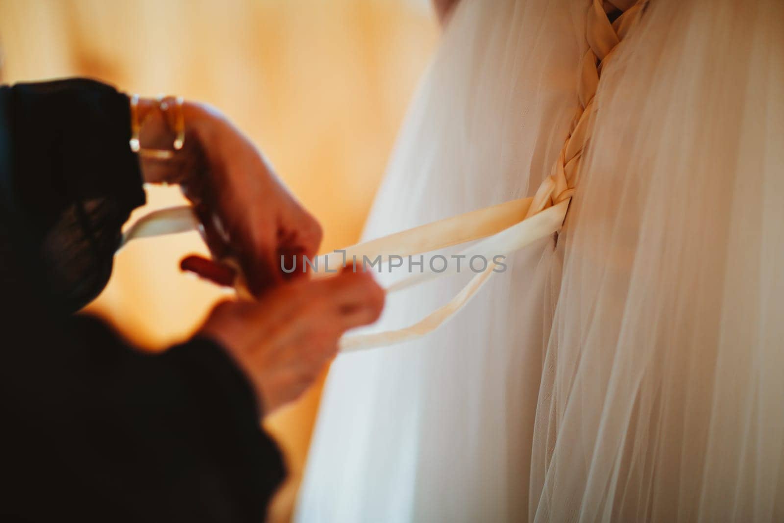 Beautiful young bride on blurred background.