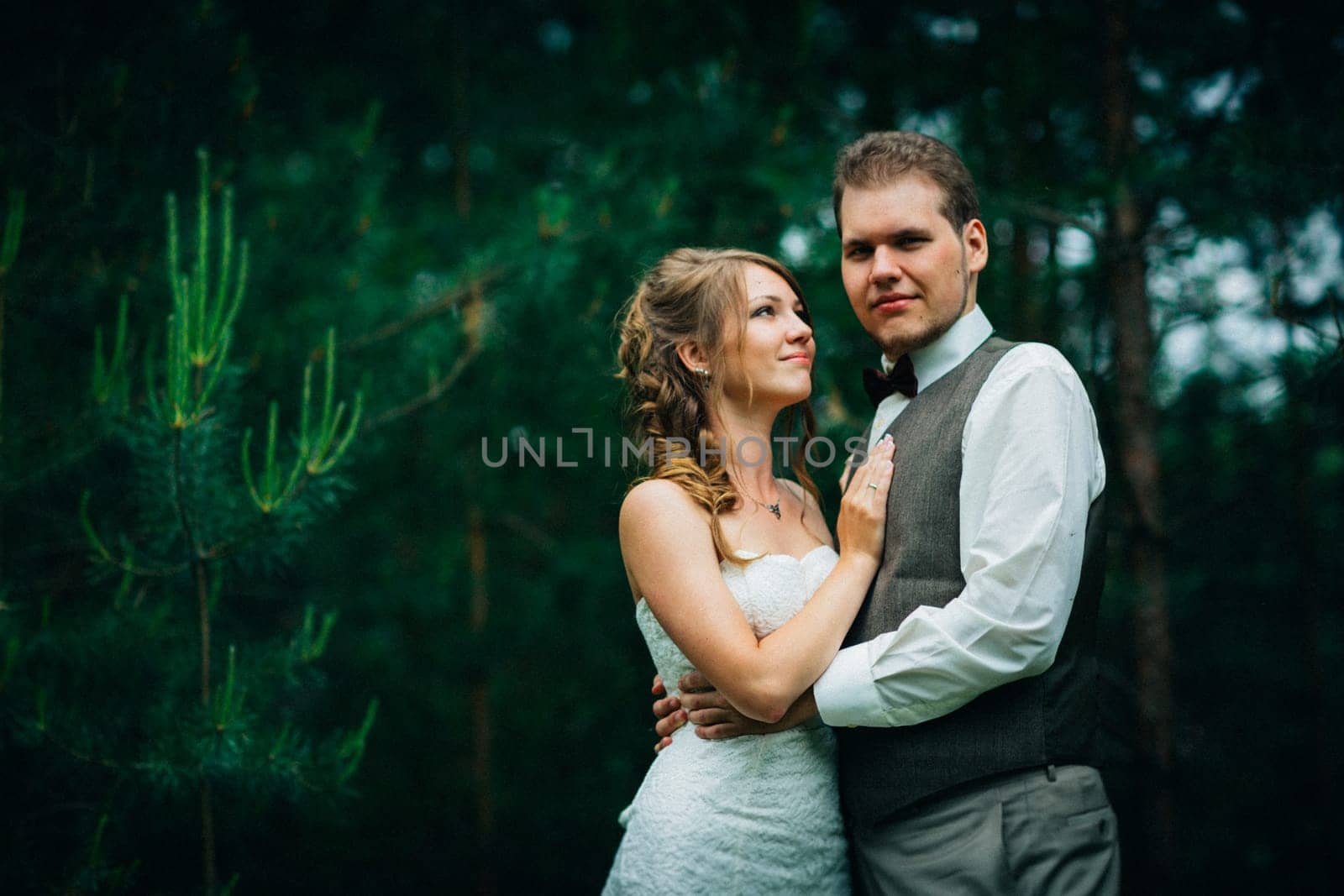 Young bride and groom in the style of provence.