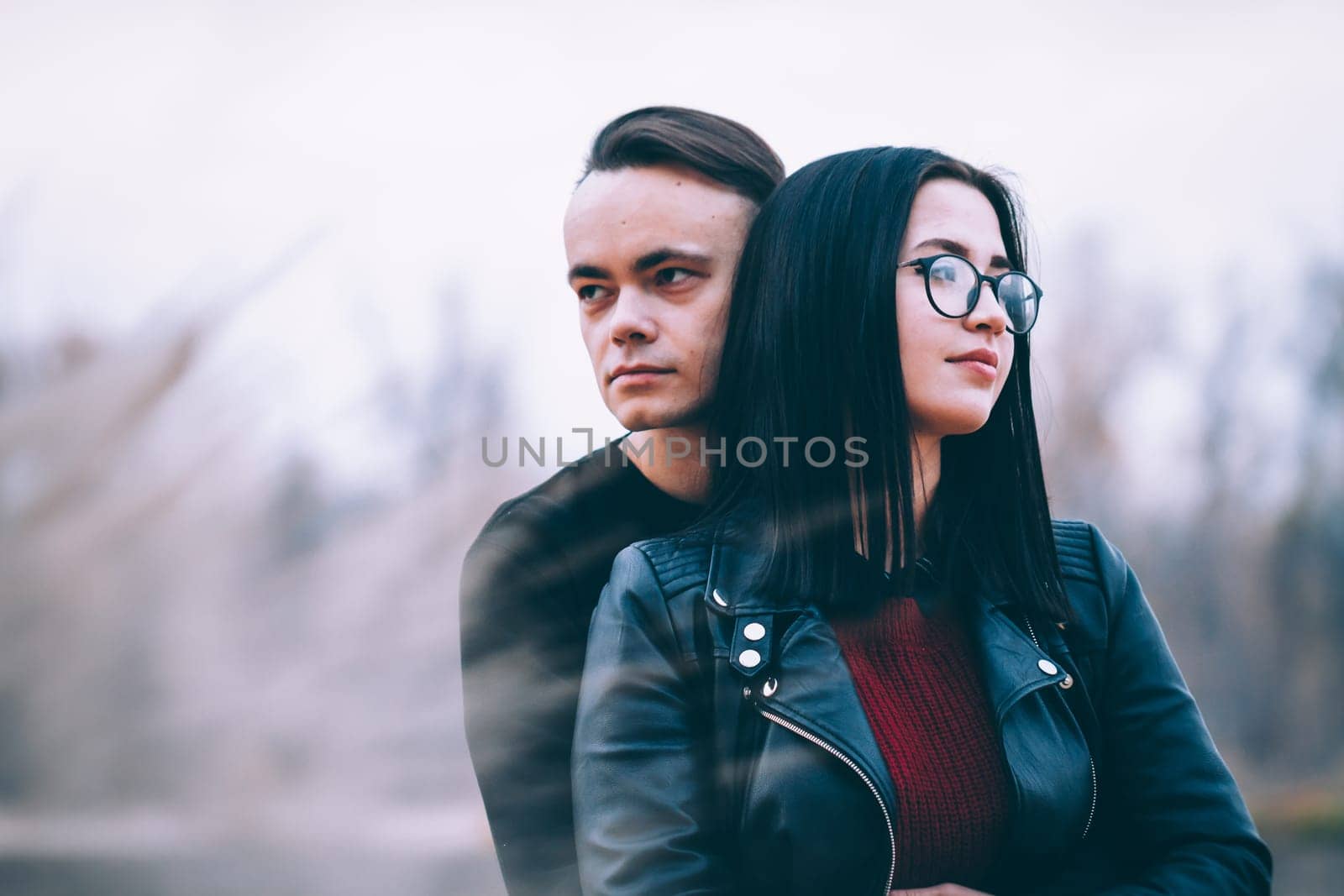 man and woman near the river autumn.