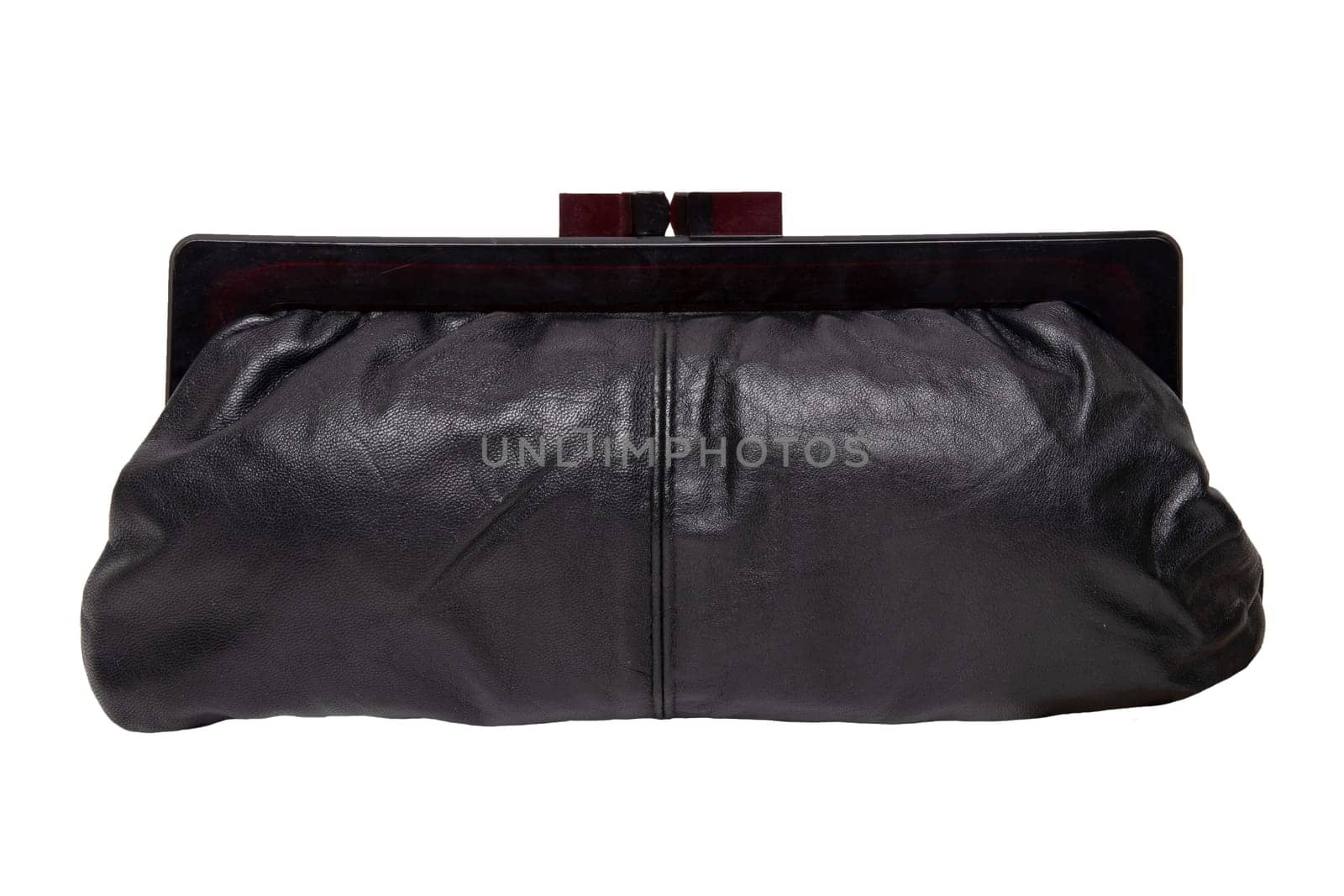 Vintage bags. A black elegant ladies handbag of the fifties isolated on a white background. A stylish handbag for the evening or for the opera. Vintage fashion.