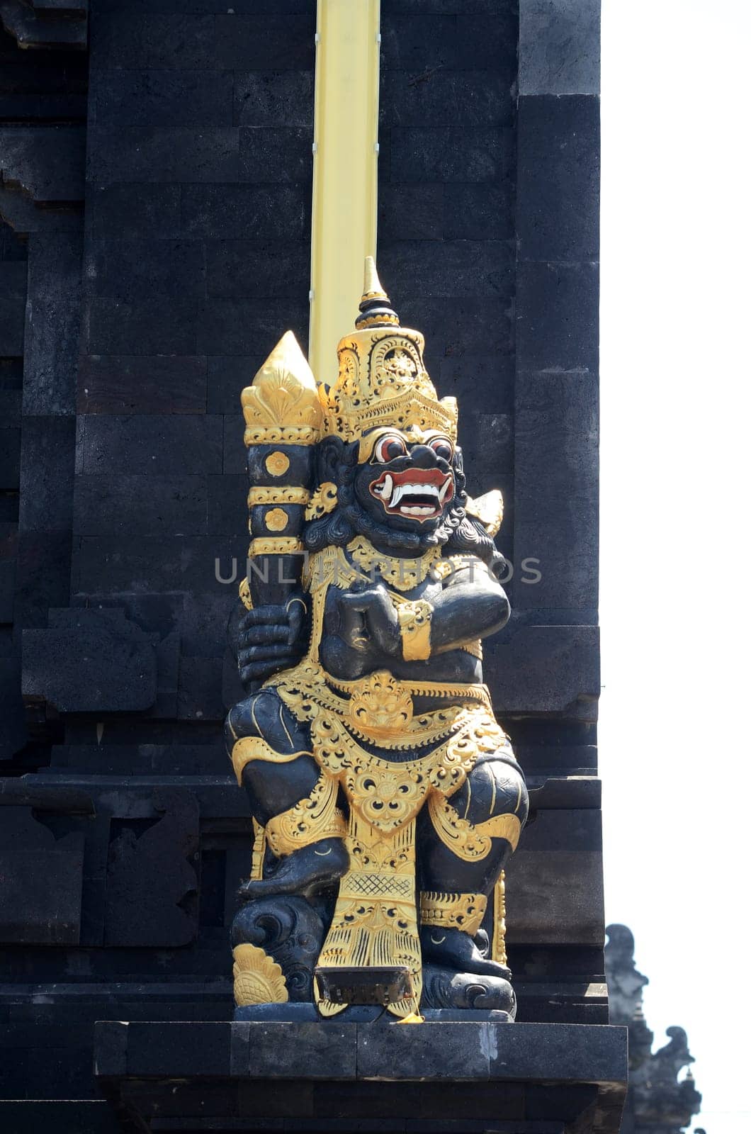 Old hindu statue in outdoor at Tanah lot of Bali, Indonesia