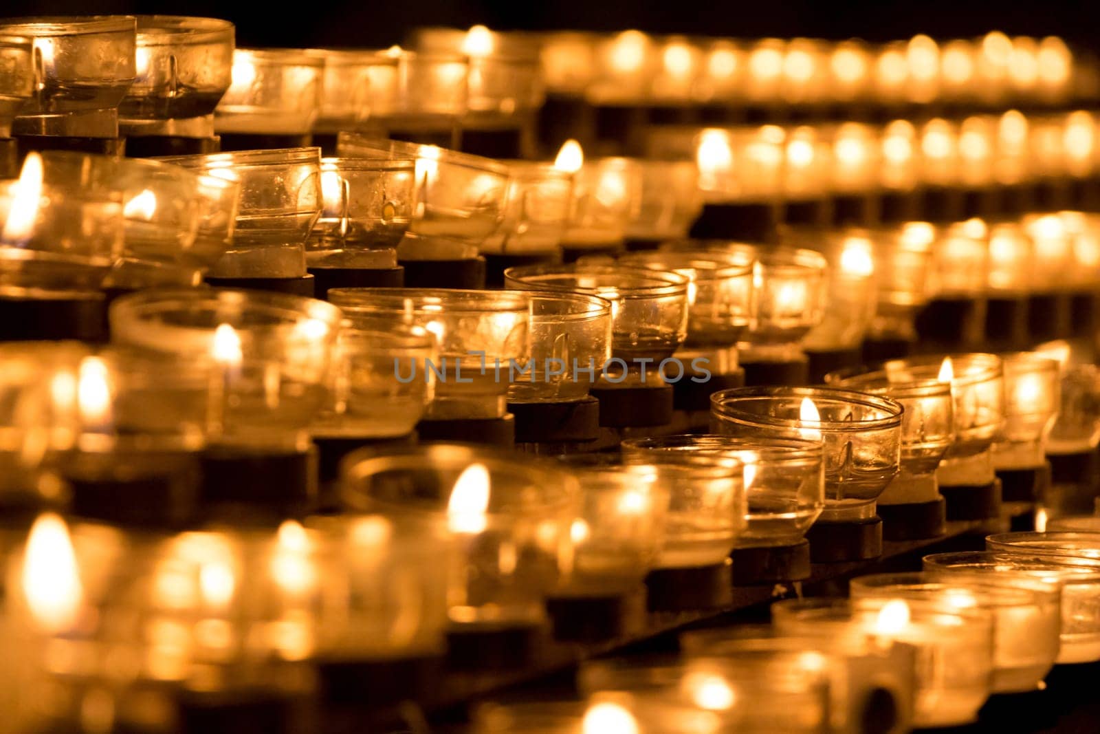 Candle is symbol of sacrifice for peace hope strength of life and soul. Also power towards sorrows and pain together in parish service