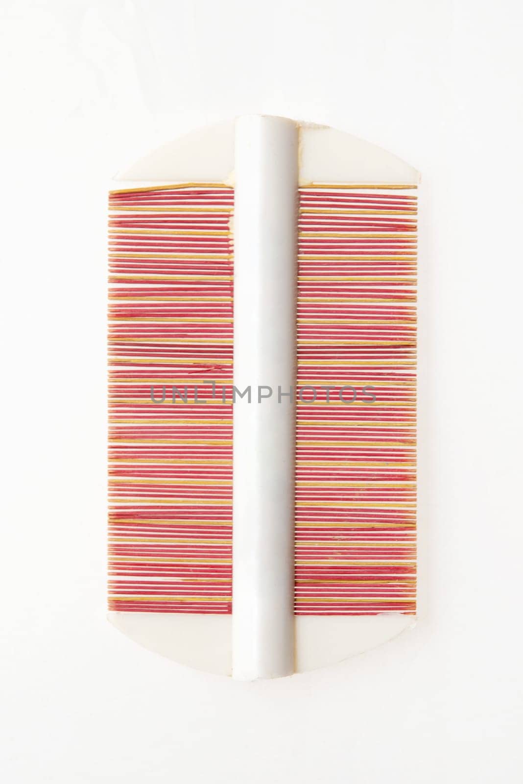 Traditional Chinese handmade wooden hair comb isolated on white background.