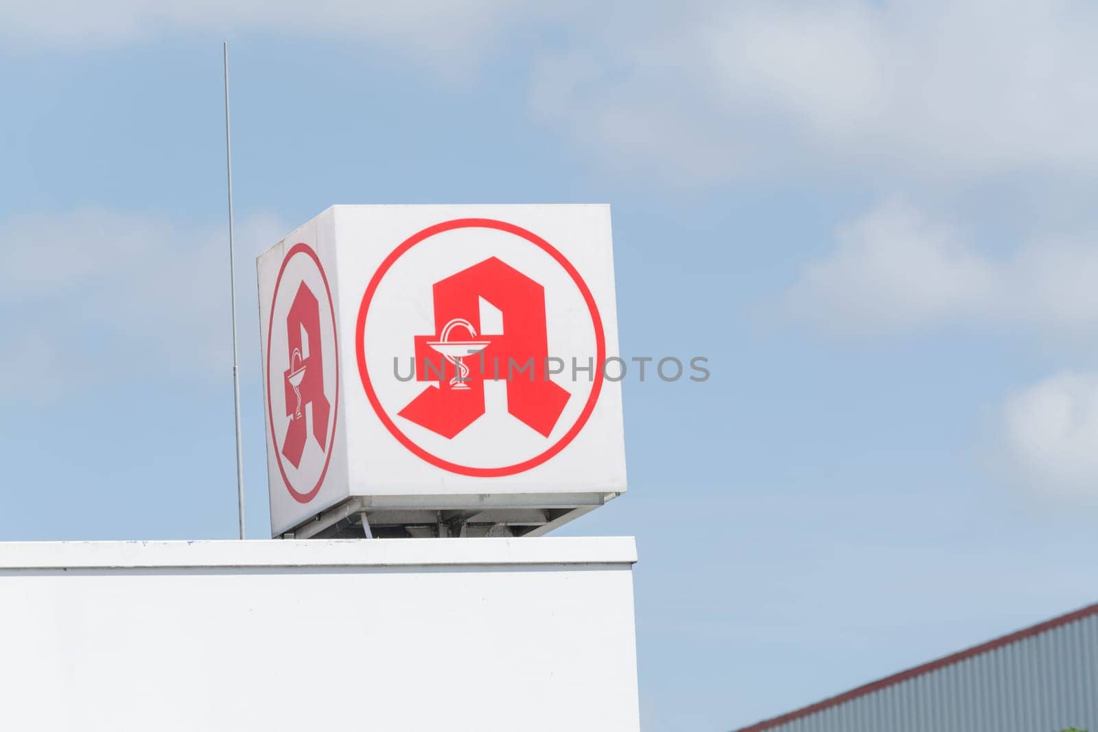RATINGEN, NRW, GERMANY - JUNE 8, 2015:.Advertising sign of a pharmacy in the building of the SB department store Gmbh Real in Ratingen.