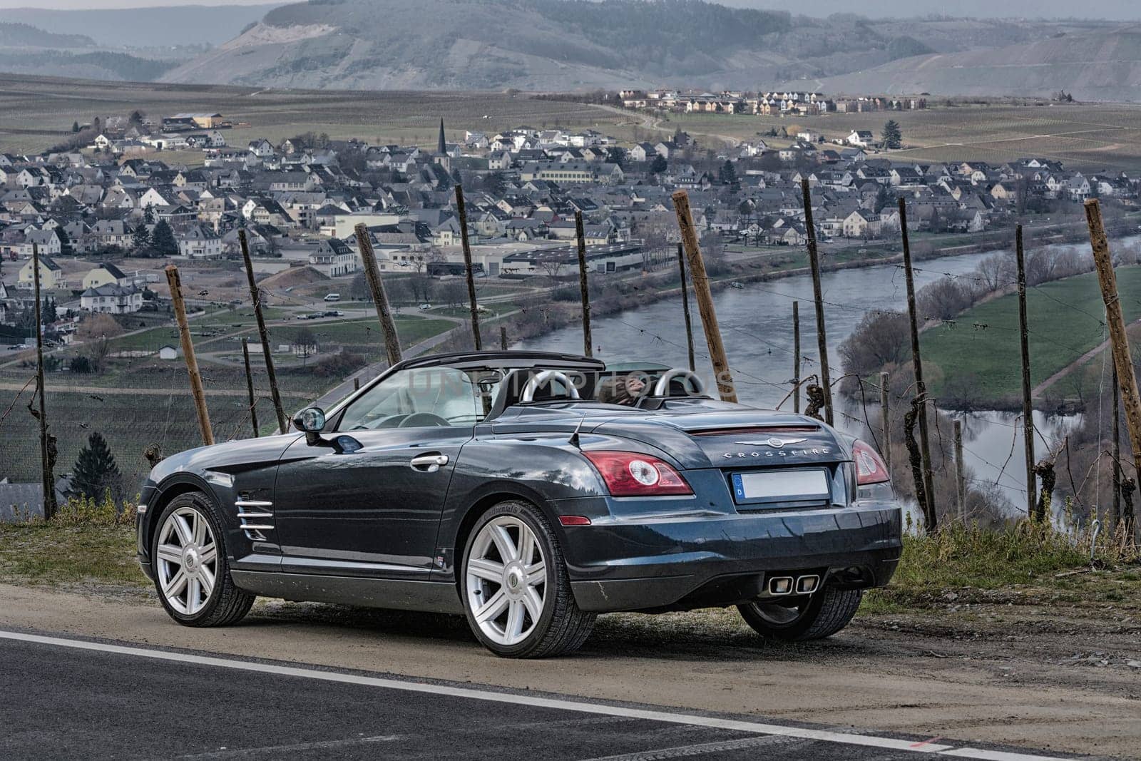 LEIWEN, GERMANY - MARCH 26, 2016:.Chrysler Crossfire on the Panorama Trail in the vineyards of Leiwen an der Mosel.