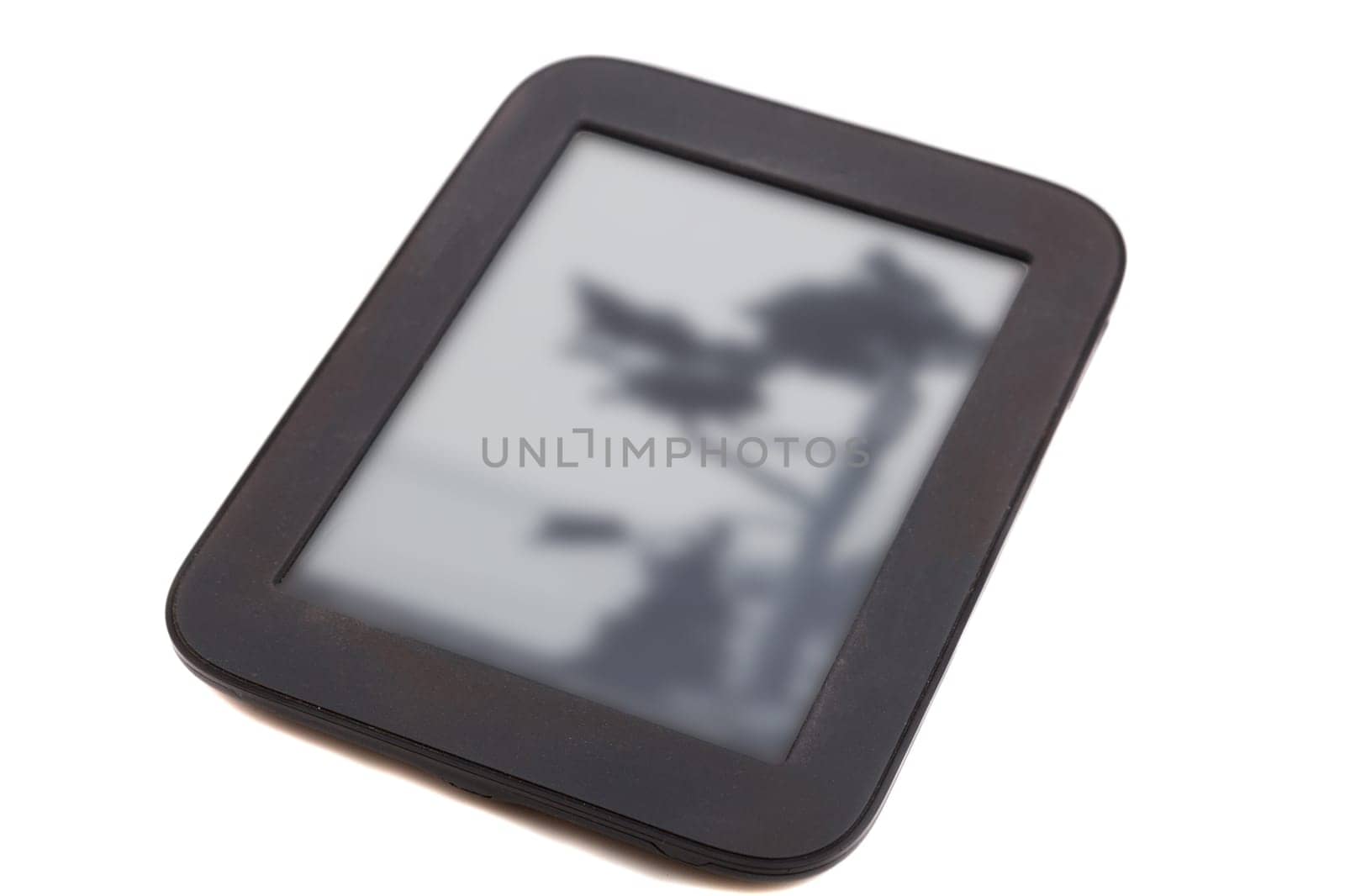 black ebook reader or tablet on white background