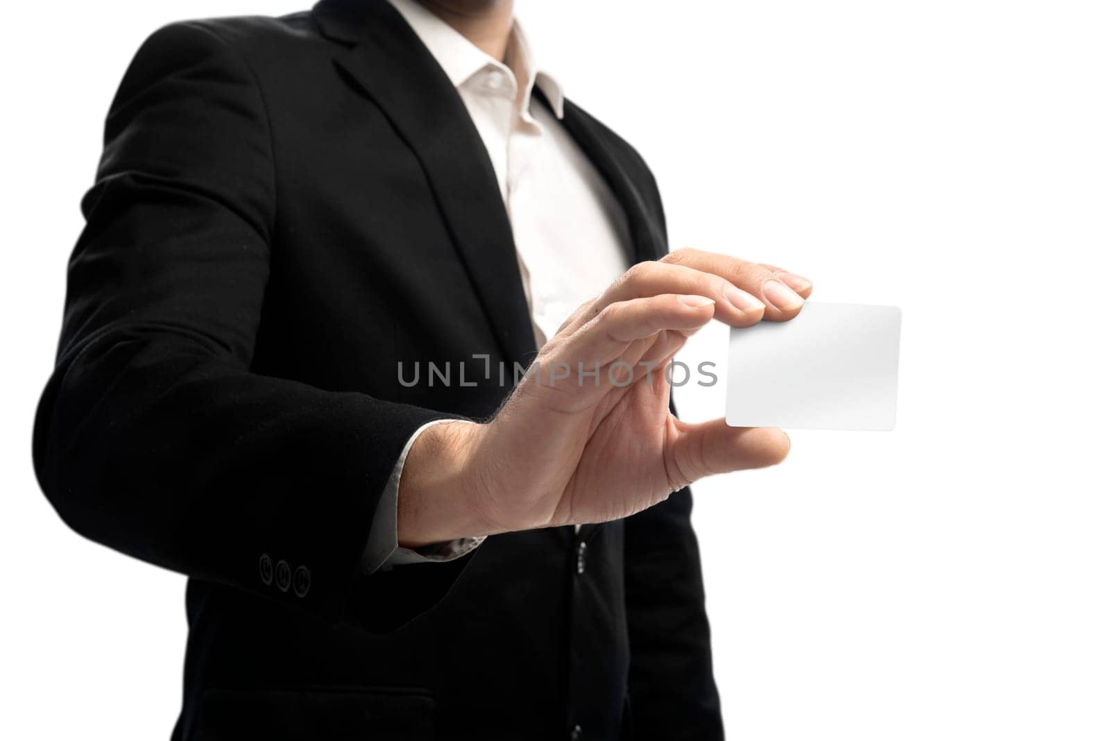 Businessman showing blank business card standing isolated over white background