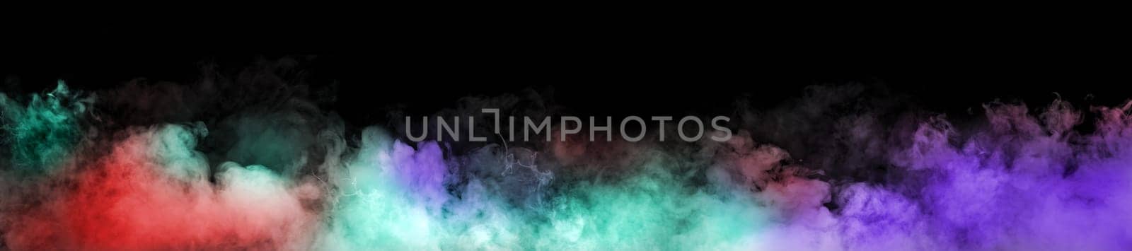 Colorful smoke on black background