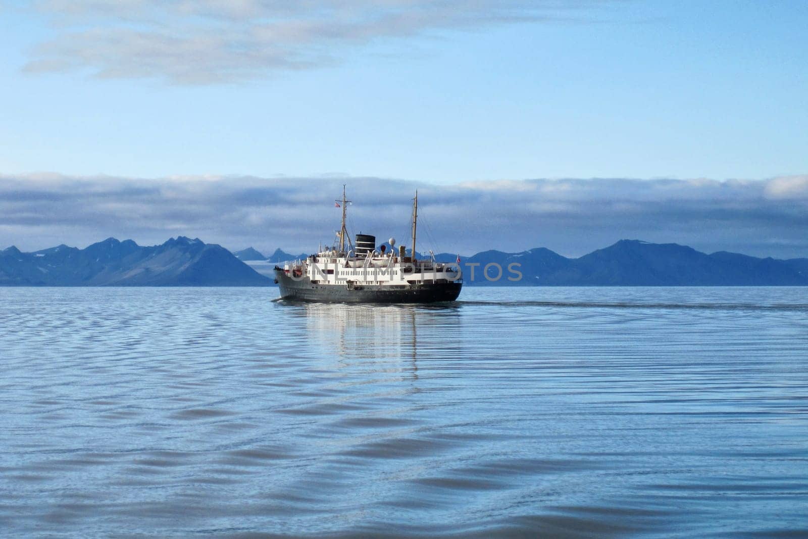 Hurtigruten post steamer at Grønfjorden, Svalbard coast