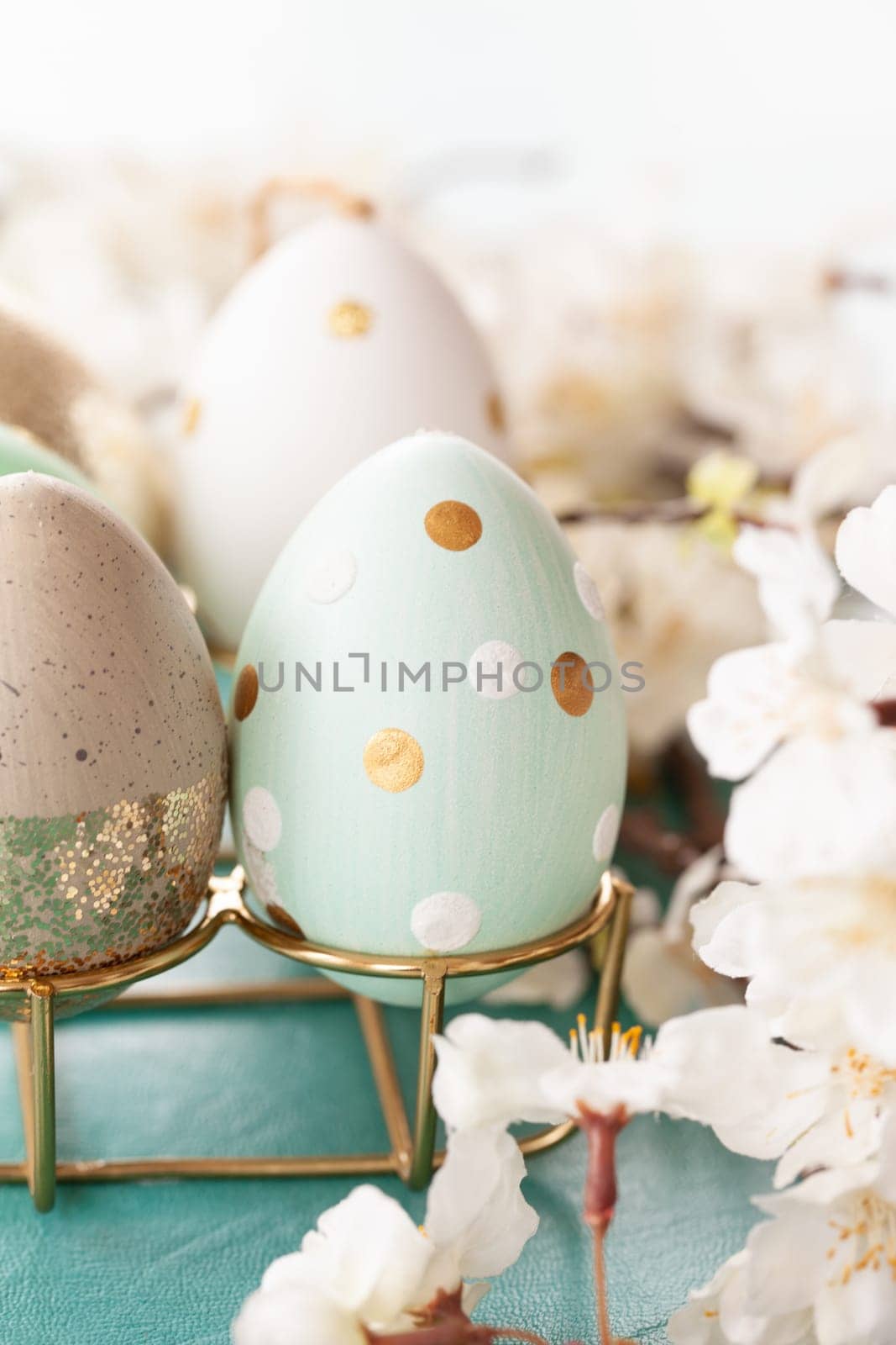 Decorative easter eggs and spring time blossoms
