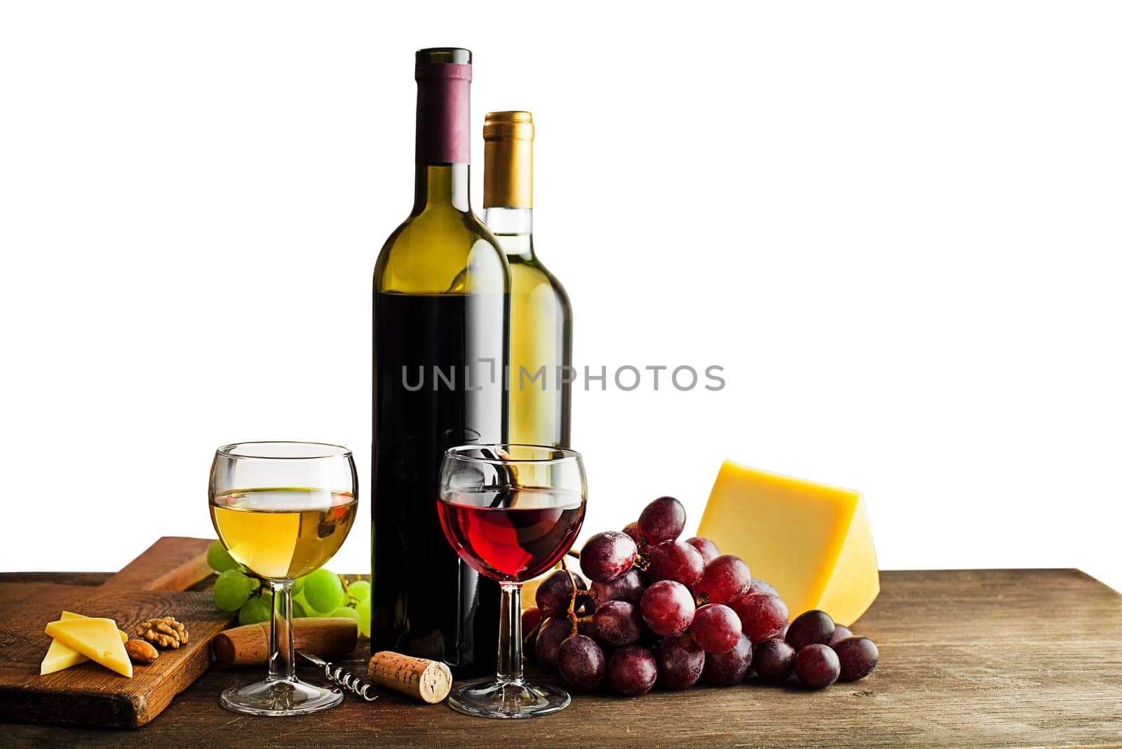 Bottle of red and white wine with snack food on white background.