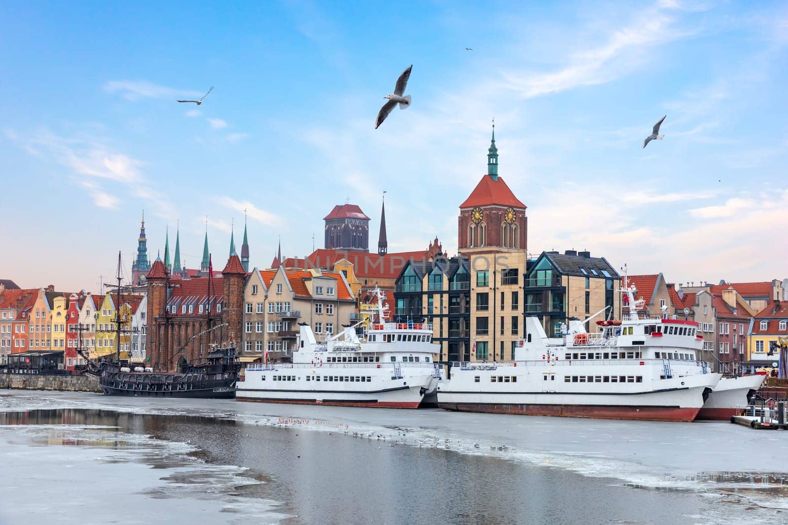 Gdansk sights and ships in the Motlawa, winter view.