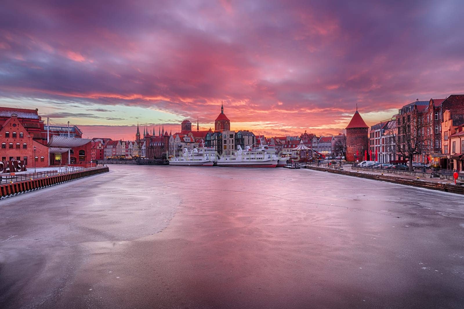 Gdansk sunset on the Motlawa river, Poland, winter view.