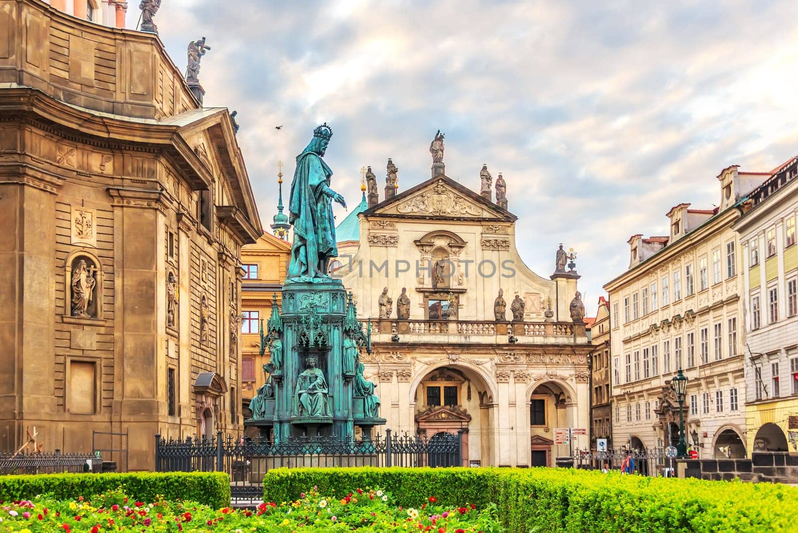 Basilica of Saint Francis of Assisi and a monument to Carlos IV in a square in Old Town of Prague.