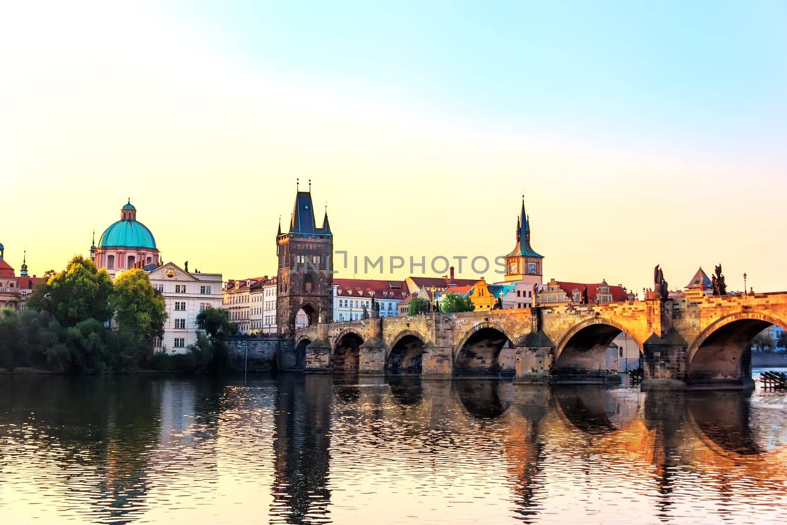 Charles Bridge, St. Francis of Assisi Church and Old Town Bridge Tower, Prague.