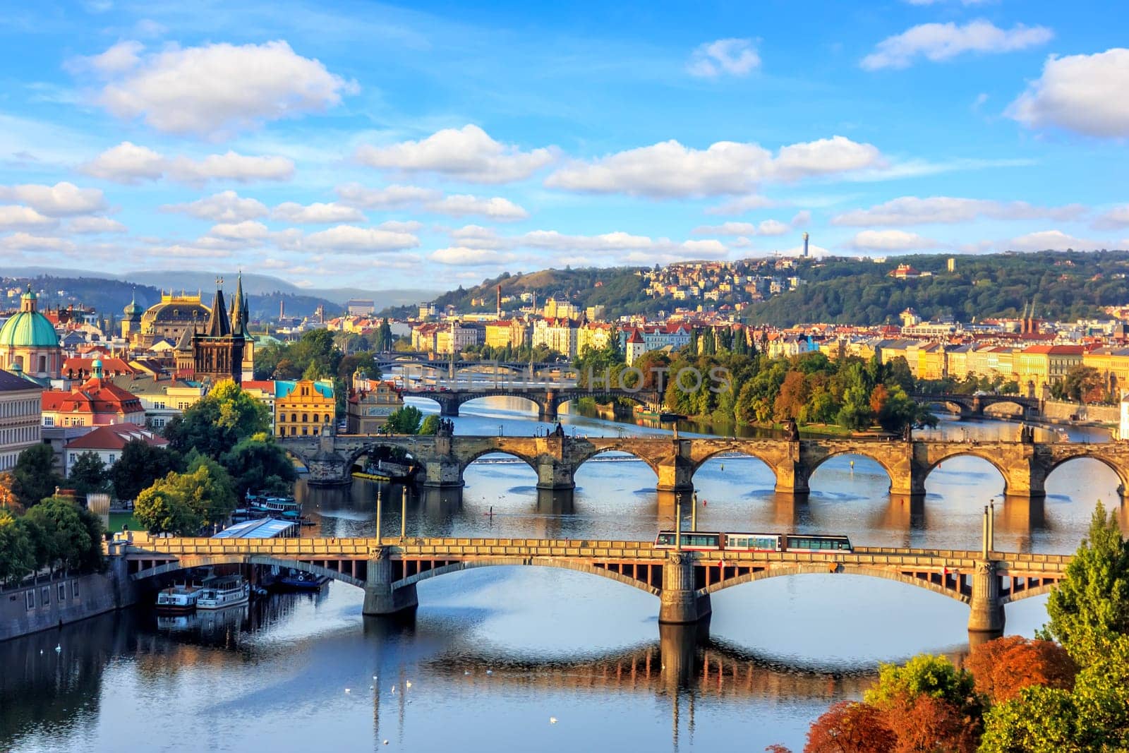 Charles bridge and other Prague bridges over the Vltava river, beautiful summer view.