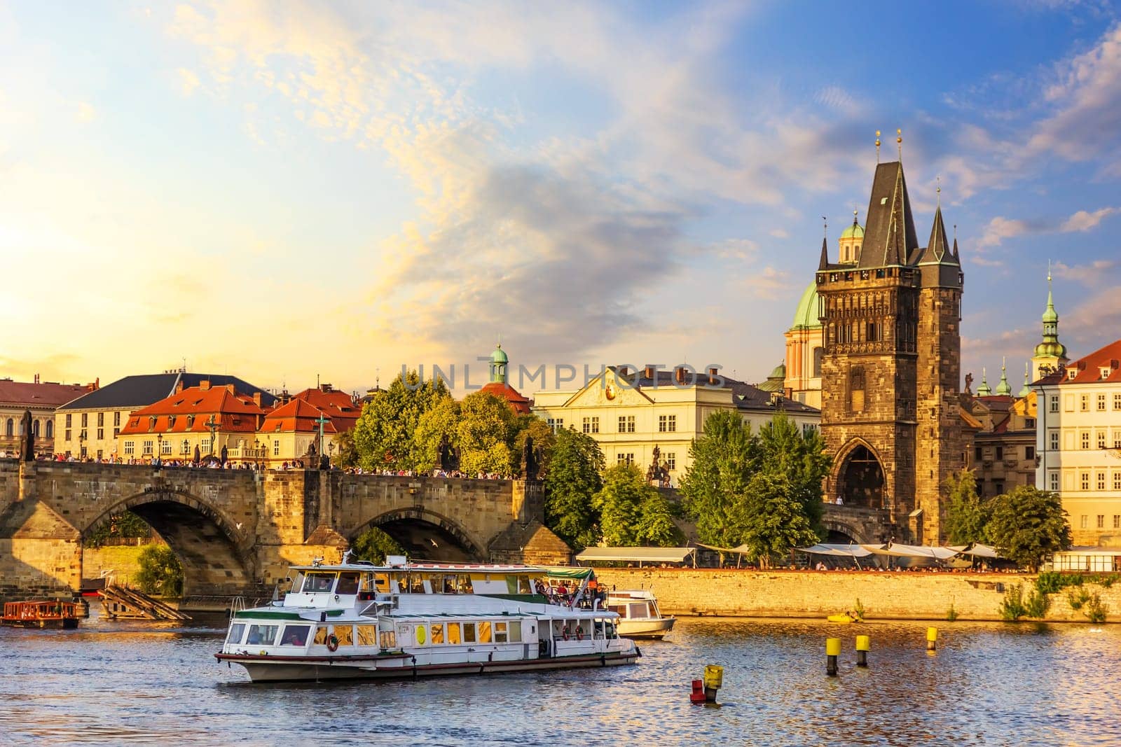 A ship in the Vltava near the Charles Bridge and Old Town Bridge Tower, Prague.