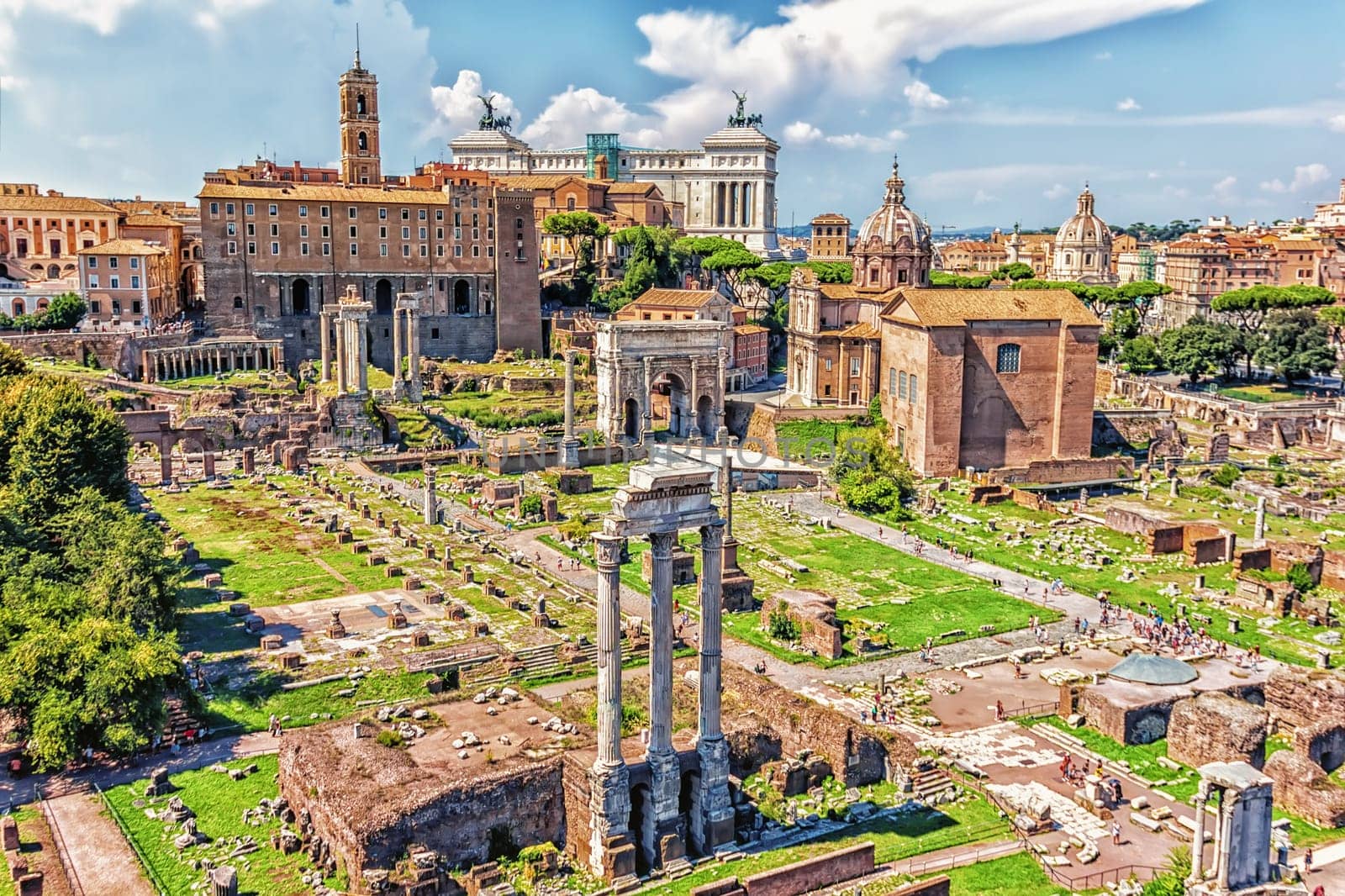 View on the Roman Forum: the Temple of Castor and Pollux, the Arch of Septimius Severus, the Temple of Saturn, the Temple of Vespasian and Titus and Basilica Aemilia
