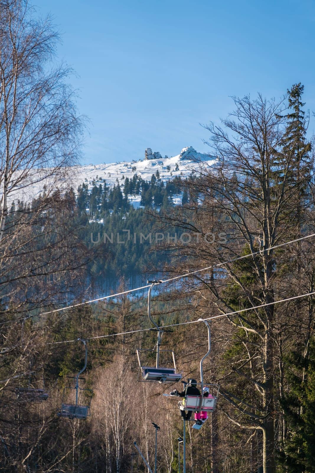 Szklarska Poreba, Poland - February 2019 : Ski lift up to the top of the Szrenica mountain in winter resort town, Karkonosze mountains
