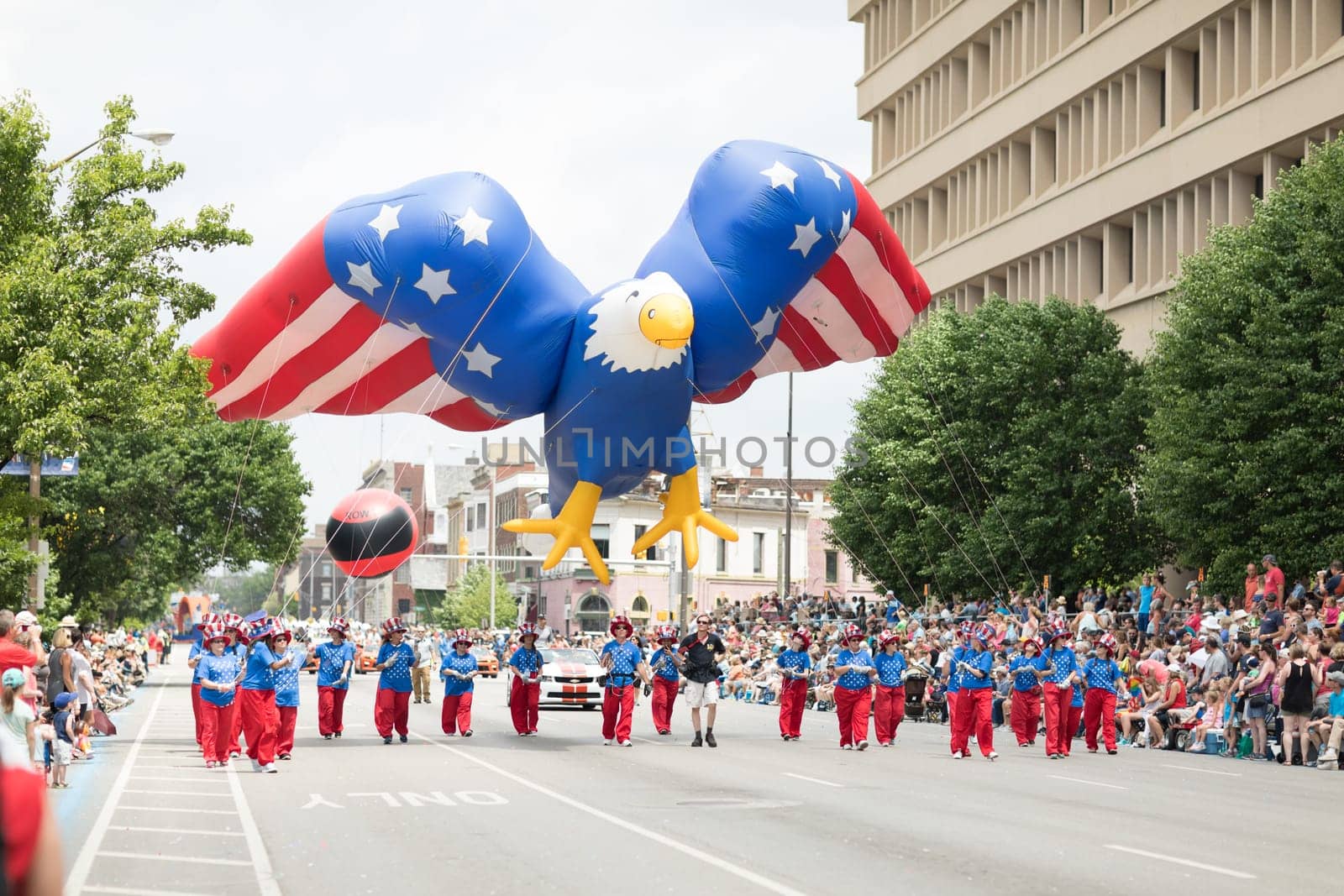 Indianapolis, Indiana, USA - May 26, 2018,  Balloon in shape of an eagle with the colors of the american flag goes down the road during the Indy 500 Parade